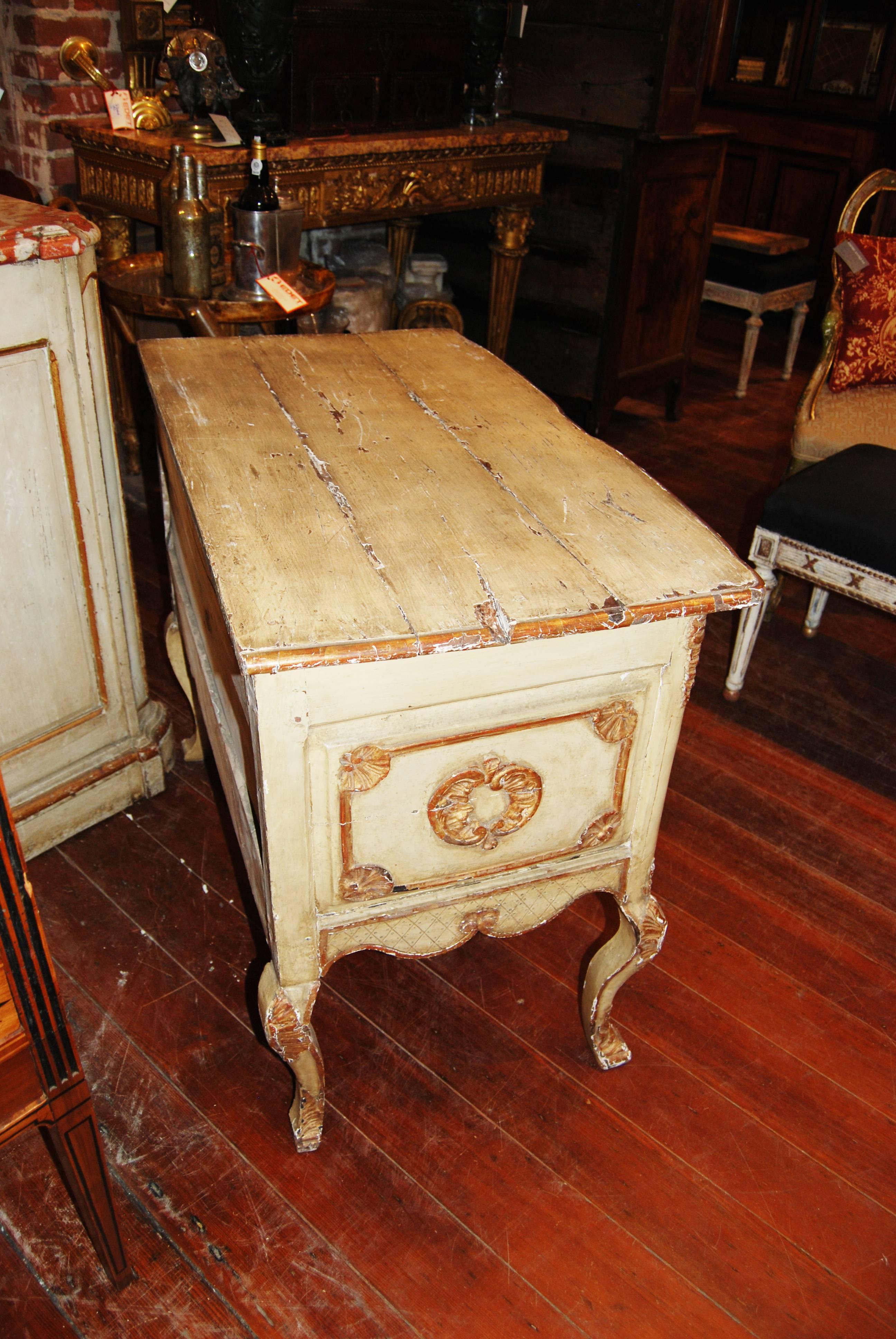 Beautifully painted and gilded petit commode.