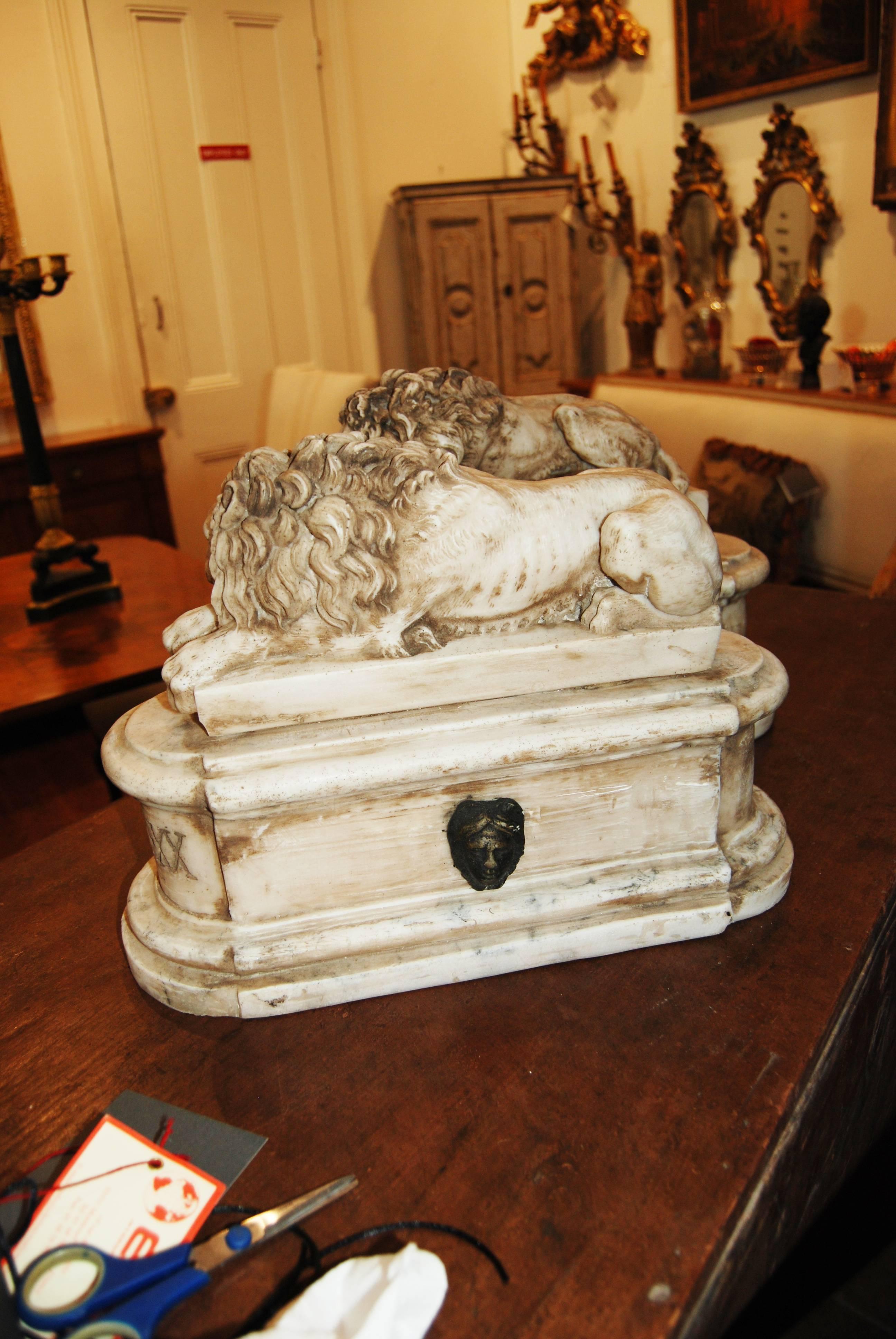 Pair of 19th century carved marble lions.