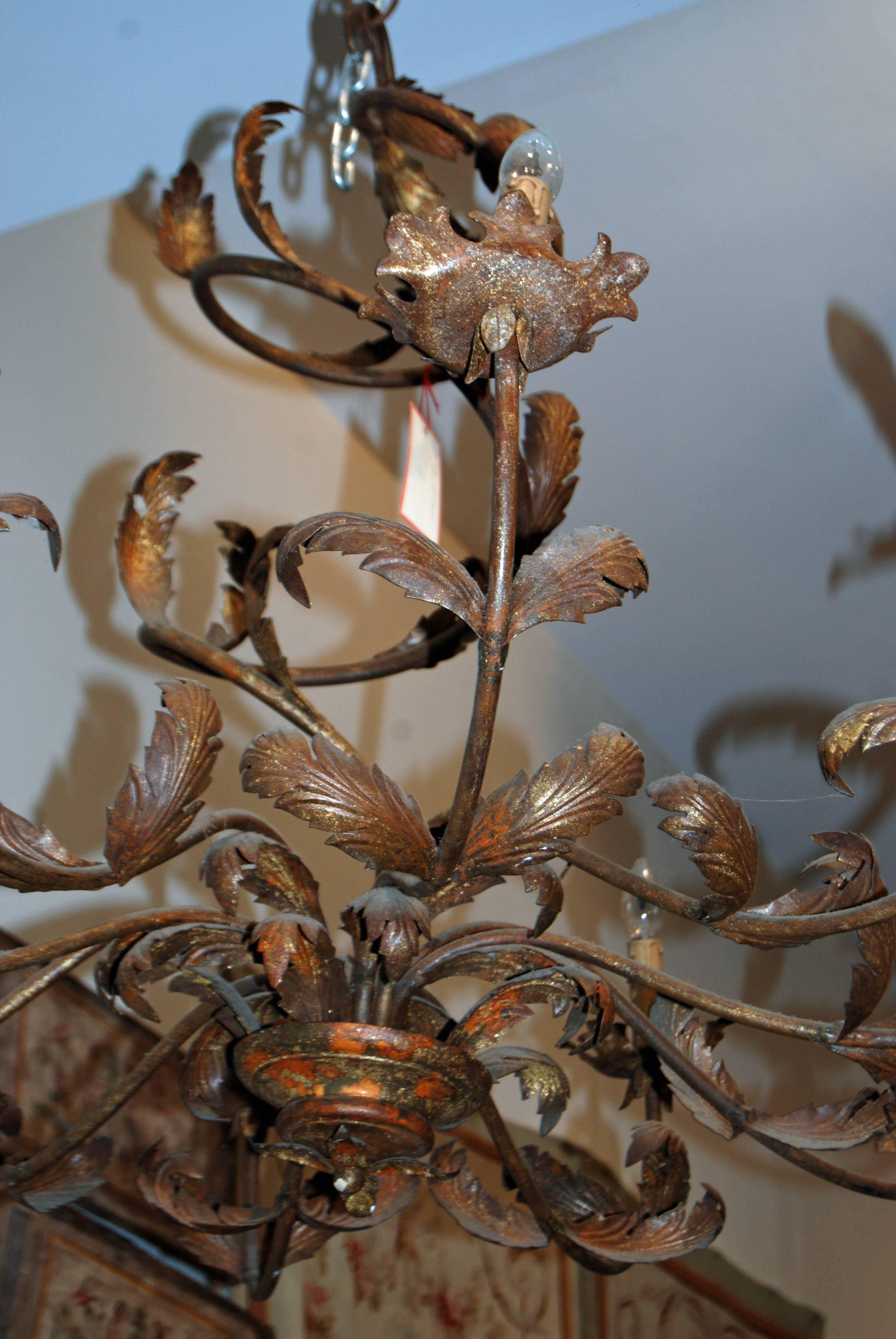 Beautiful pair of iron chandeliers
there is a slight difference in coloration depending on lighting.