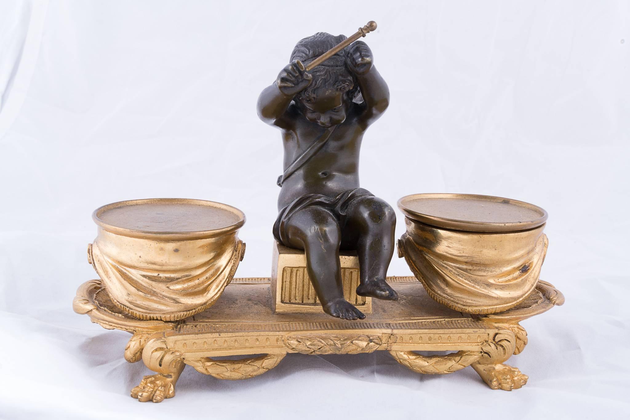19th century bronze doré inkwell boy and dog
19th century bronze doré inkwell angel and drums.