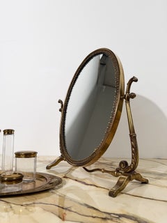 Miroir de salle de bains ovale italien en laiton coulé, datant du milieu du siècle, de style néoclassique