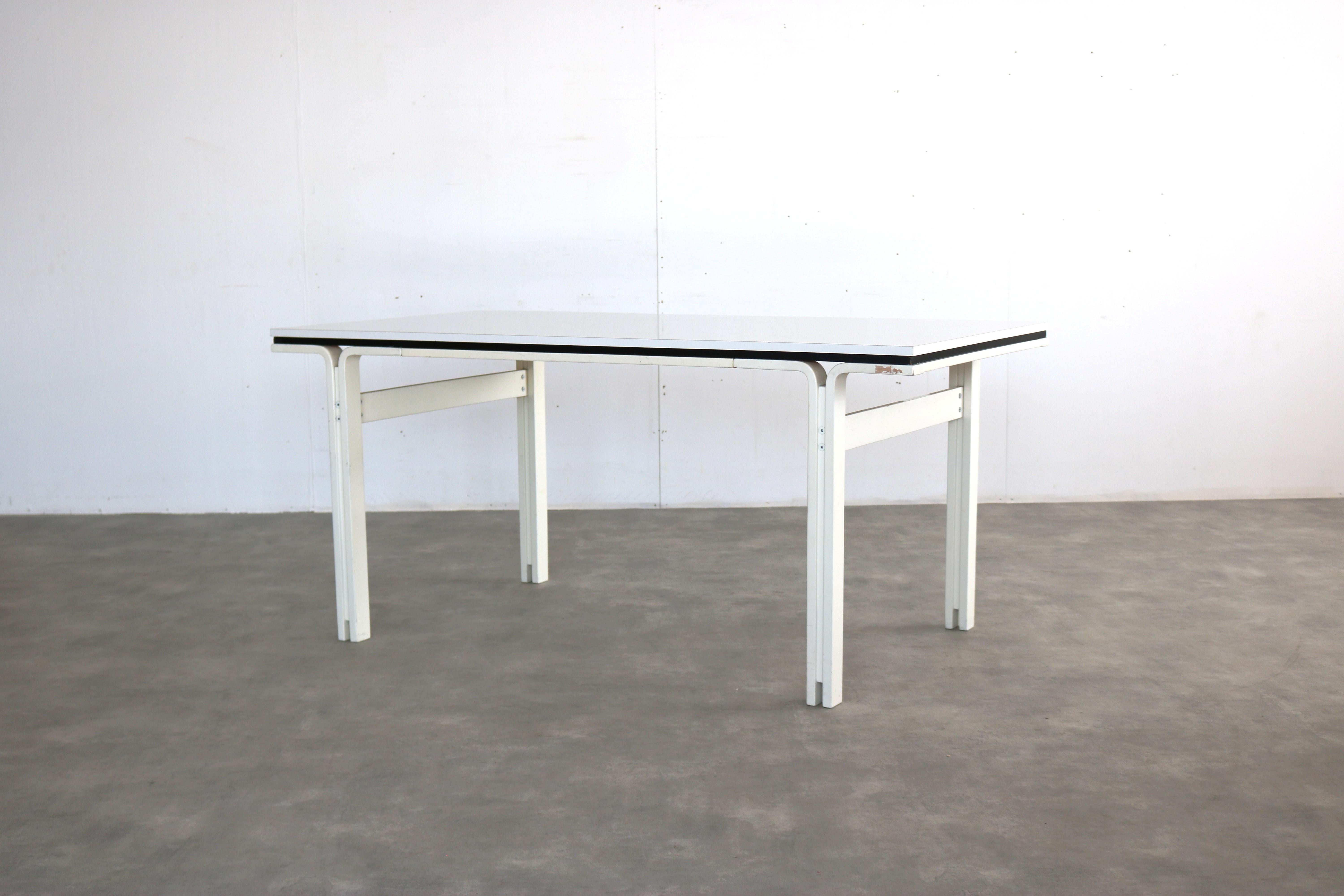 vintage dining table  table  70s  Pastoe

period  70s
design  Pastoe  Netherlands 
condition  good  minor signs of use
size  75 x 165 x 85 (hxbxd)

details  wood; formica; matching chairs available;

item number  2860