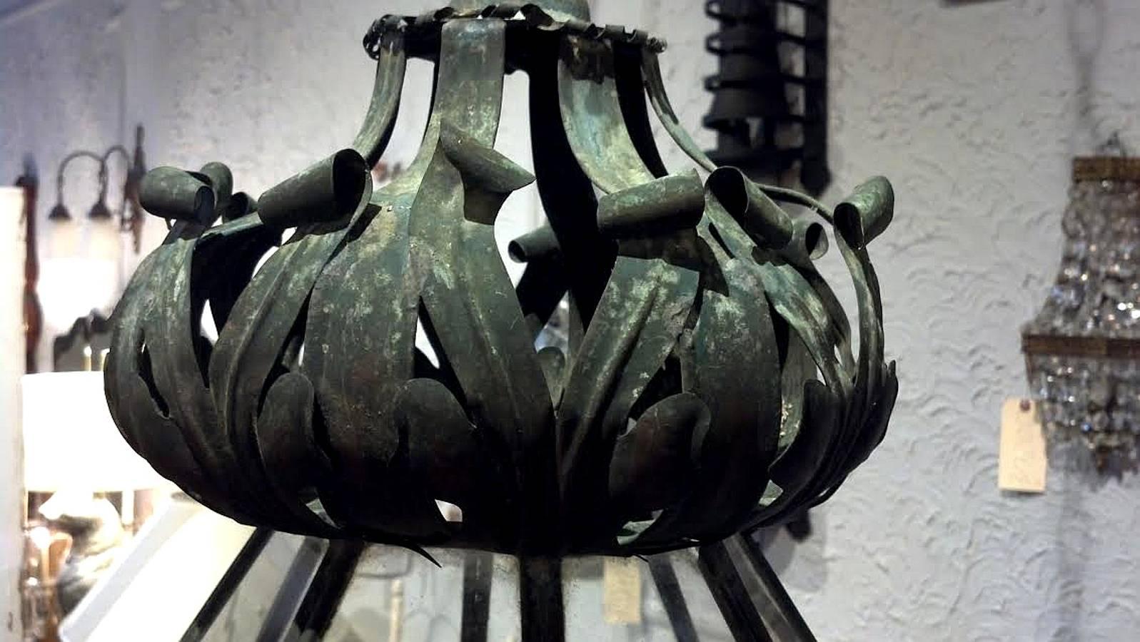 Spectacular eight-sided,  large architectural lanterns made of copper, beautiful patina.
I love the flame detailed crown and unusual decorative details.