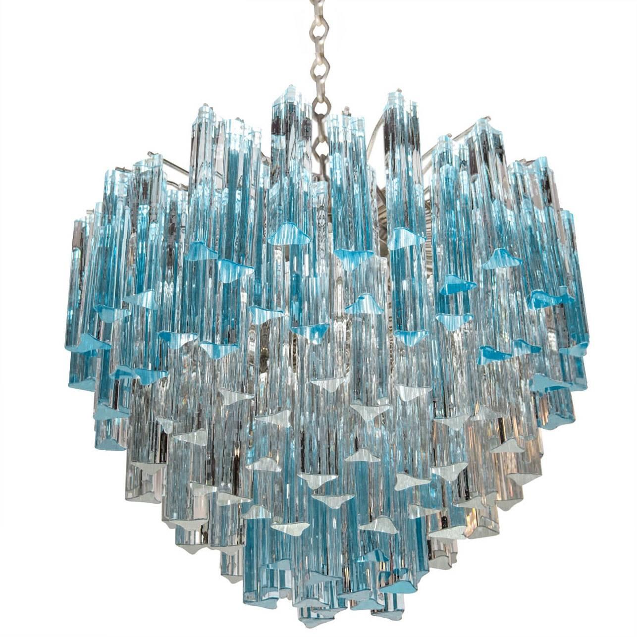 Spectacular and flawless pair of mid century chandeliers with a combination of Camer aquamarine and clear crystal pendants. Italy, circa 1960.  Chrome frames are fully restored. Priced as a pair.  Please note that this is a web-only, direct ship