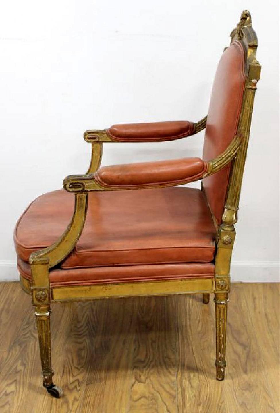 In the Louis XVI fashion, these chairs are elegant and yet very masculine. The current surface shows great character but can be restored if you prefer for a fee.

The upholstery is a very "Maison Jansen" style burnt sienna color but can