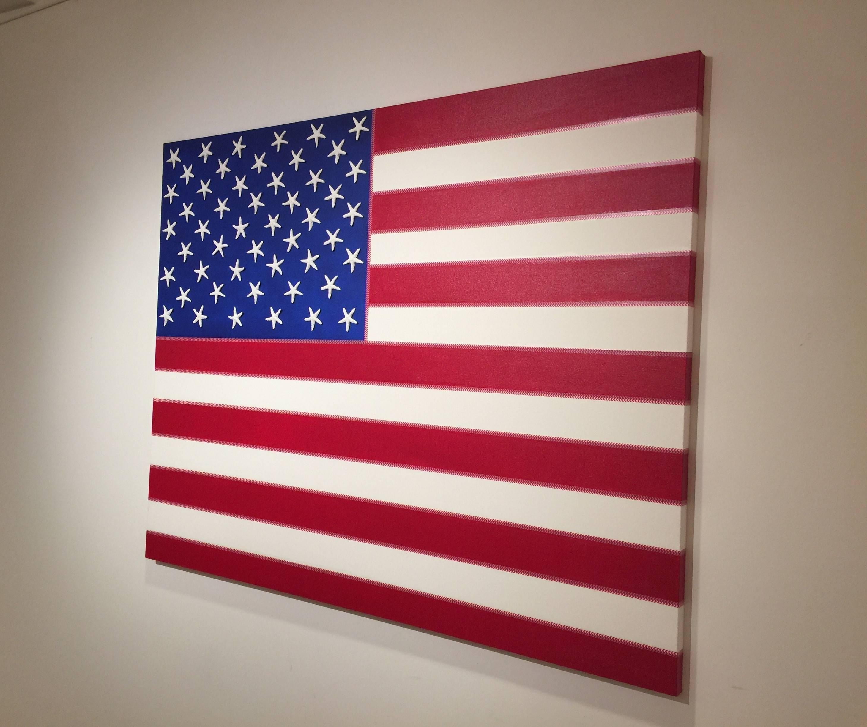 American Flag No. 1 by J. Wohnseidler.
Arcylic on canvas with hand-applied starfish.
Unframed.
Signed/titled/dated by artist on back.
Measures: 48 inches L x 36 inches H x 1.5 inches D.