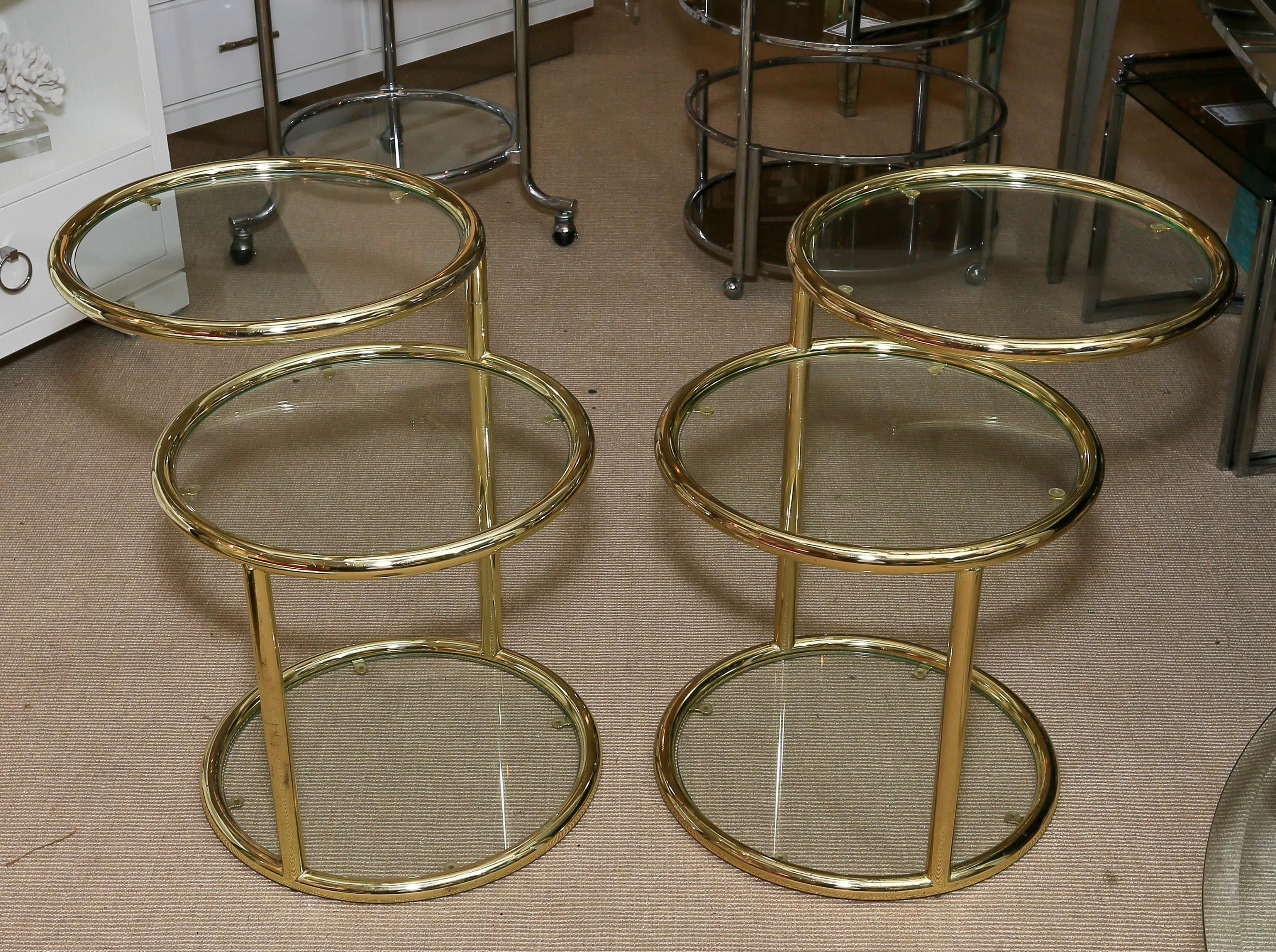 Attractive Pair of Mid-Century Brass Three-Tier Mechanical Tables