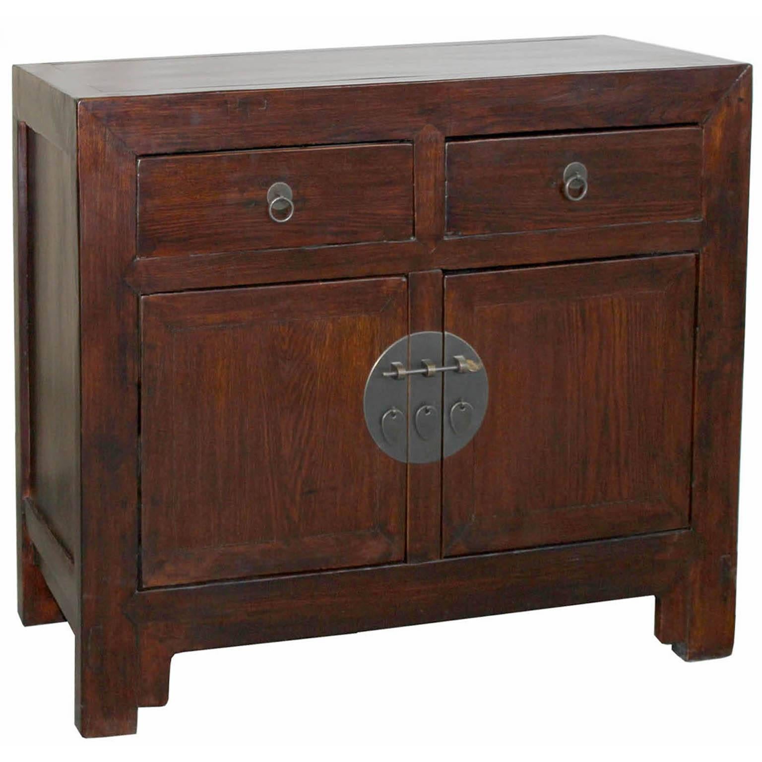 Two-door elm side chest with straight bottom skirt. Middle bar removes for easy interior access. New hardware, Beijing, China, circa 1900. Some wear.