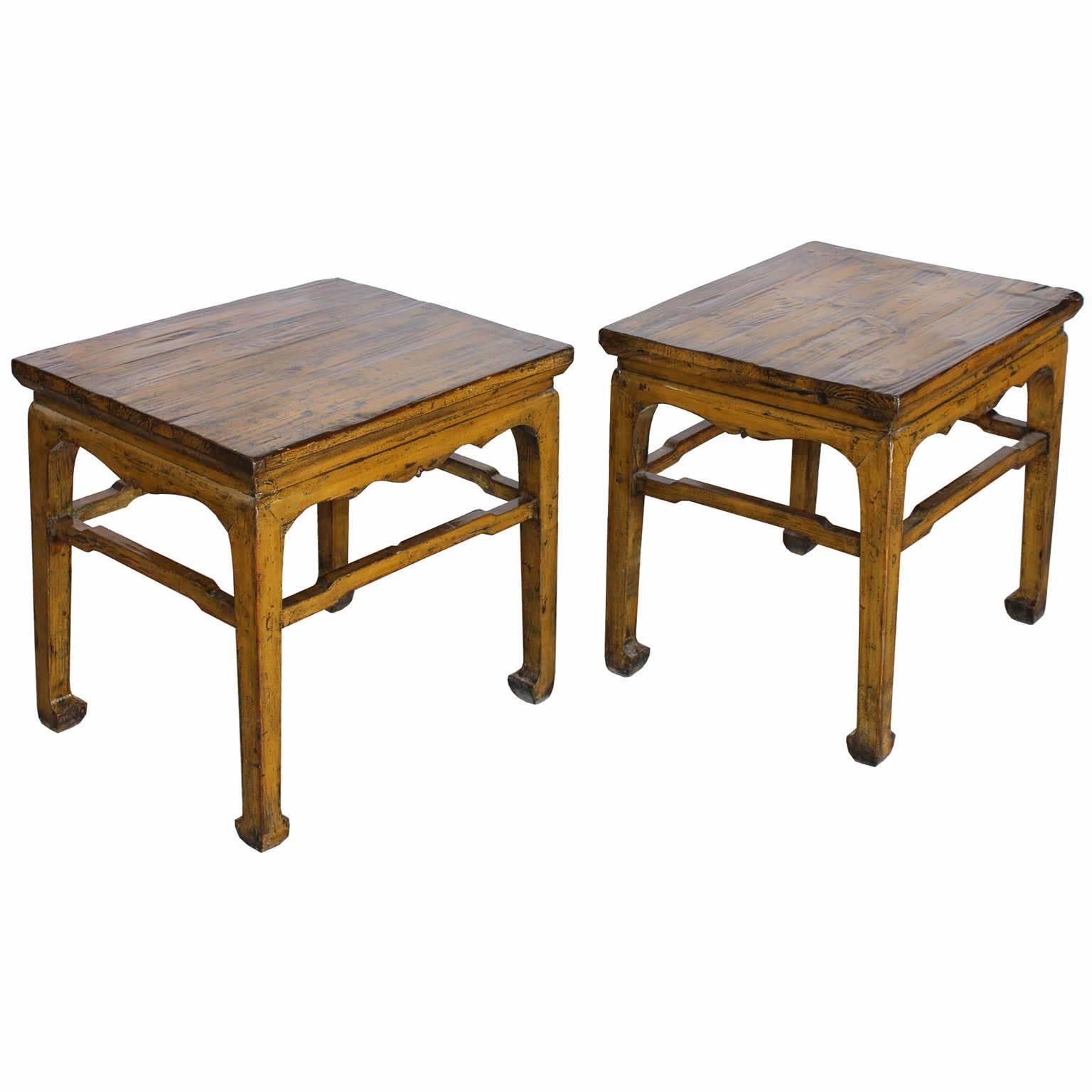 Mustard lacquer table with scalloped lip, support bars and horse hoof-style feet. Use in front of a sofa as coffee tables or as a side table next to an armchair, China, circa 1900.