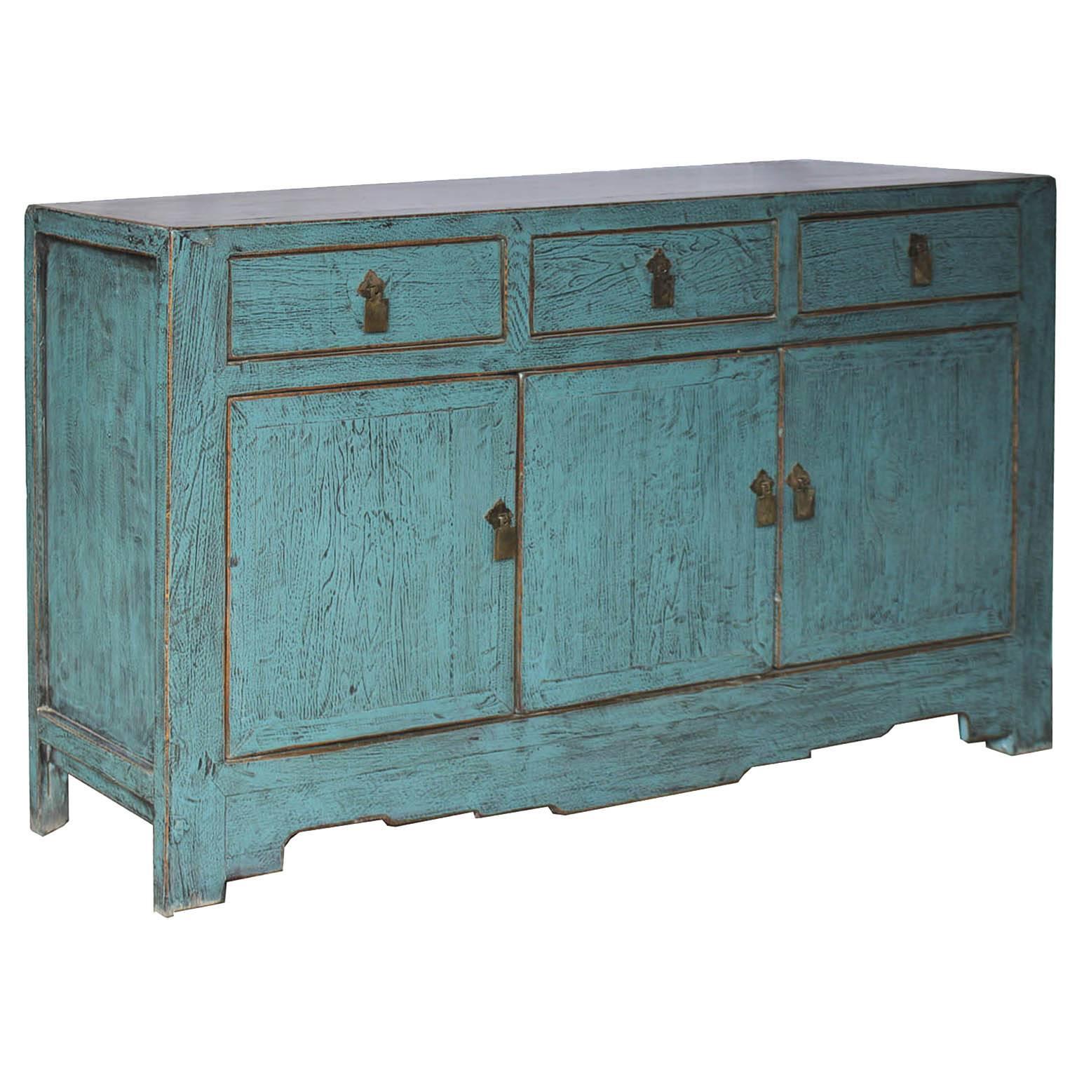 Robin’s egg blue lacquer sideboard with three drawers, exposed wood edges and tiered bottom skirt would be a focal point in a contemporary interior. Tianjin, China, circa 1900s.