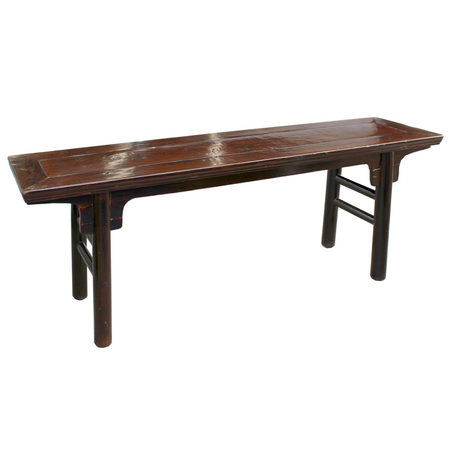 Elegant wood bench with spandrels, side supports and rounded legs. Place at the end of the bed, use as seating for a dining table, or as a coffee table in front of a sofa.