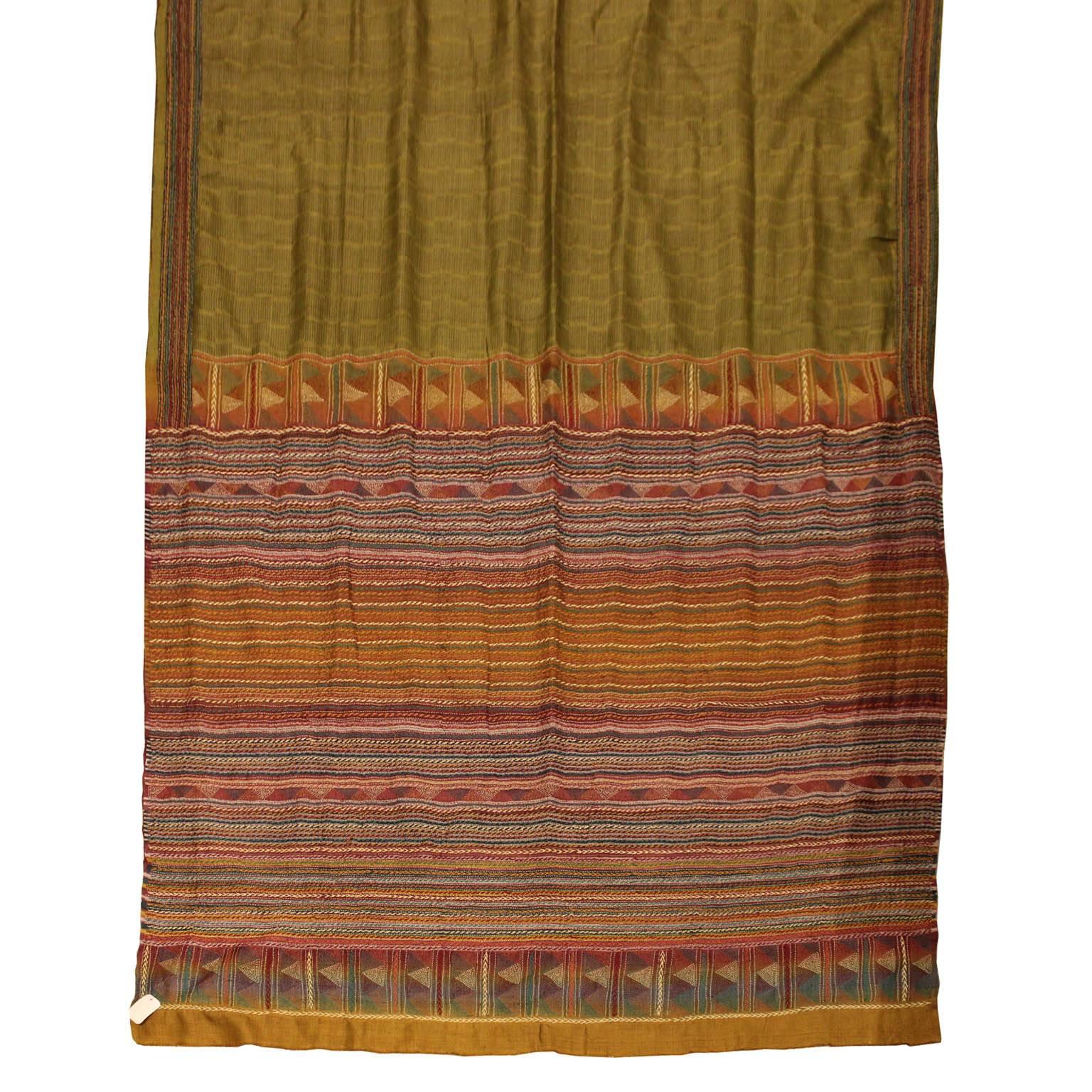 Contemporary olive green silk sari. Exquisitely hand-printed with vegetable dye, hand-stitched with kantha embroidery, a Popular Style from West Bengal, also the oldest form of embroidery. 7 months to produce from start to finish.
One of a kind
