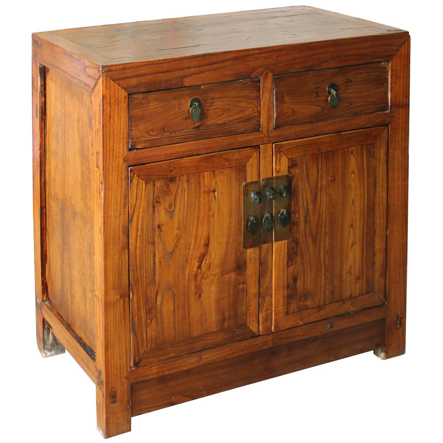 Beijing chest with beautiful elm grain and clean lines can be placed next to a sofa with a lamp and accessories on top. Middle bar removed for easy interior access, with new shelf and hardware, circa 1900s.