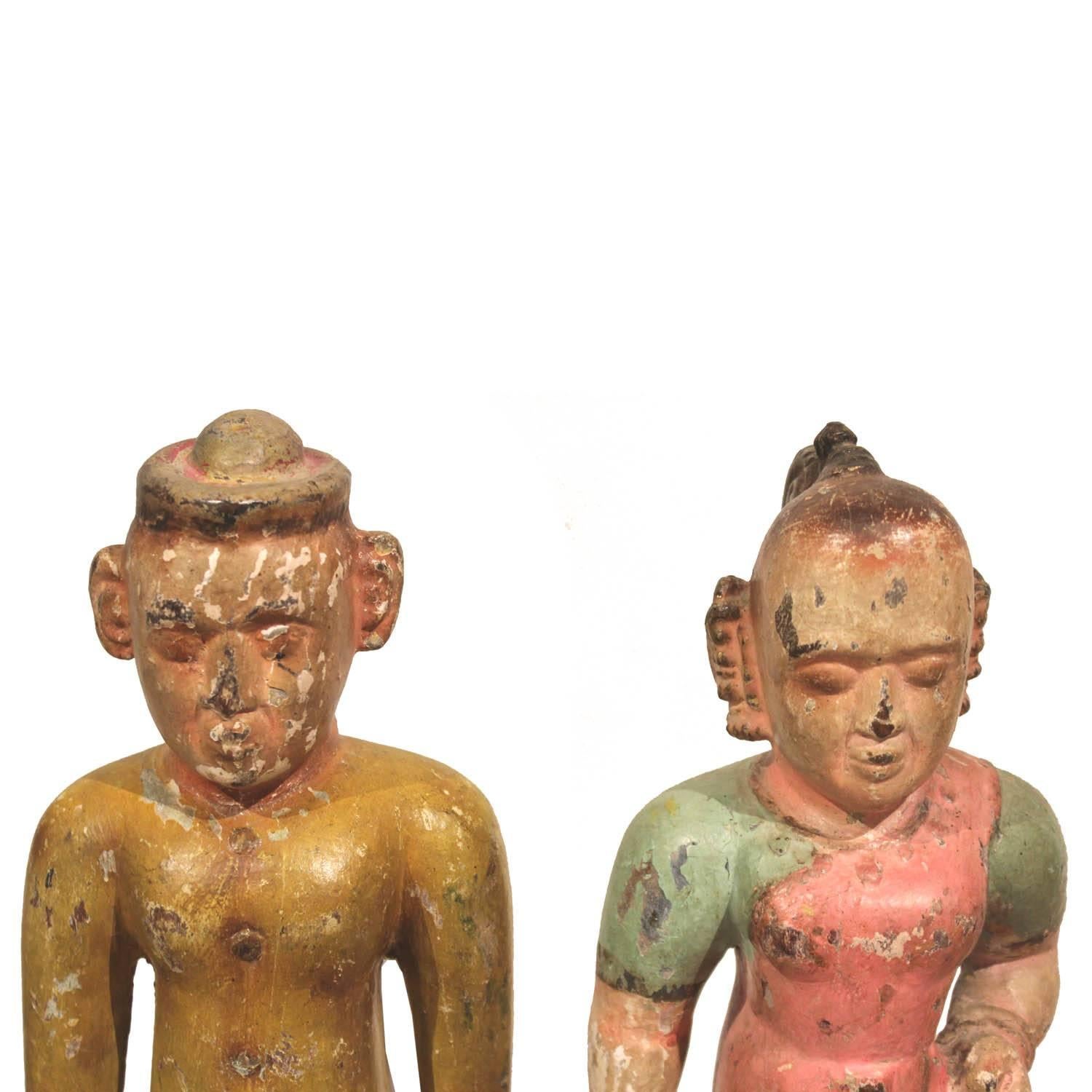 Primitive Folk Art, one of a kind hand-carved wooden dolls depicting a statue of a man and wife from southern India.
       