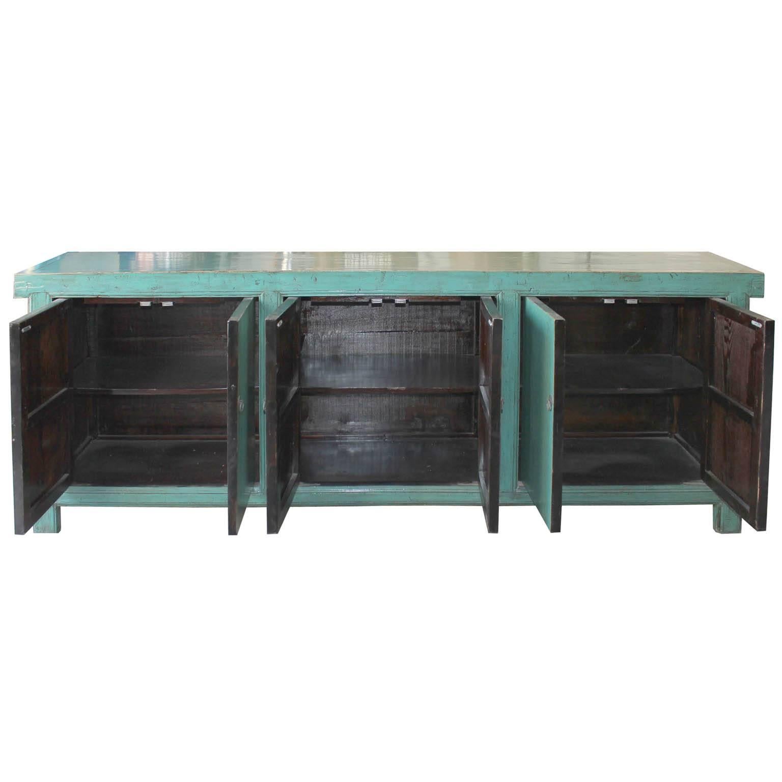 Six-door turquoise lacquer buffet would be a pop of color in any contemporary room. Clean lines, simple hardware, with lots of storage makes this sideboard ideal underneath a large piece of art work or flat screen TV. New shelving and hardware.