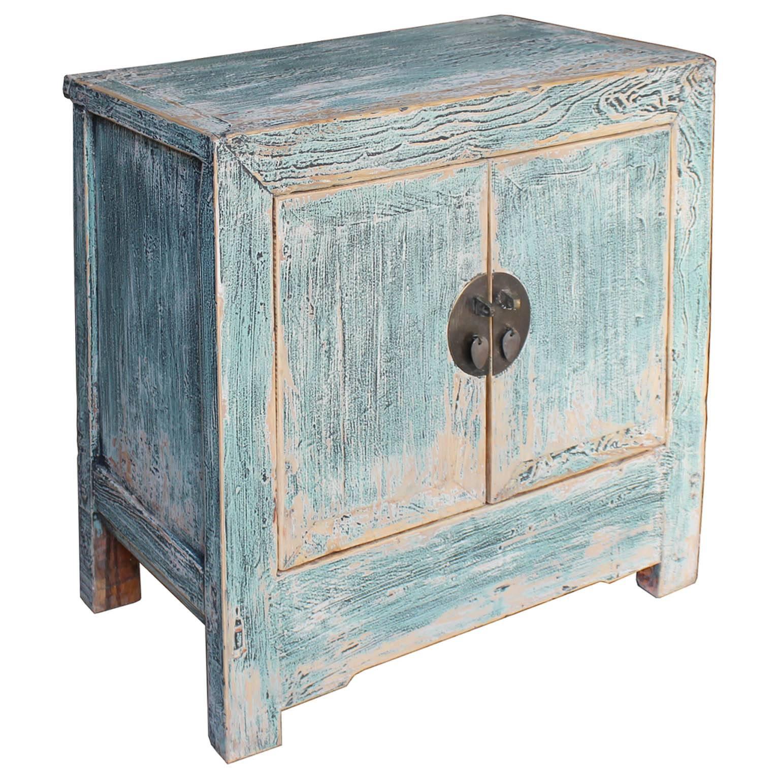 Classic Beijing chest refinished in light green/blue dry finish.  Use in the bedroom or as an entryway piece. New shelf and hardware, circa 1920s.