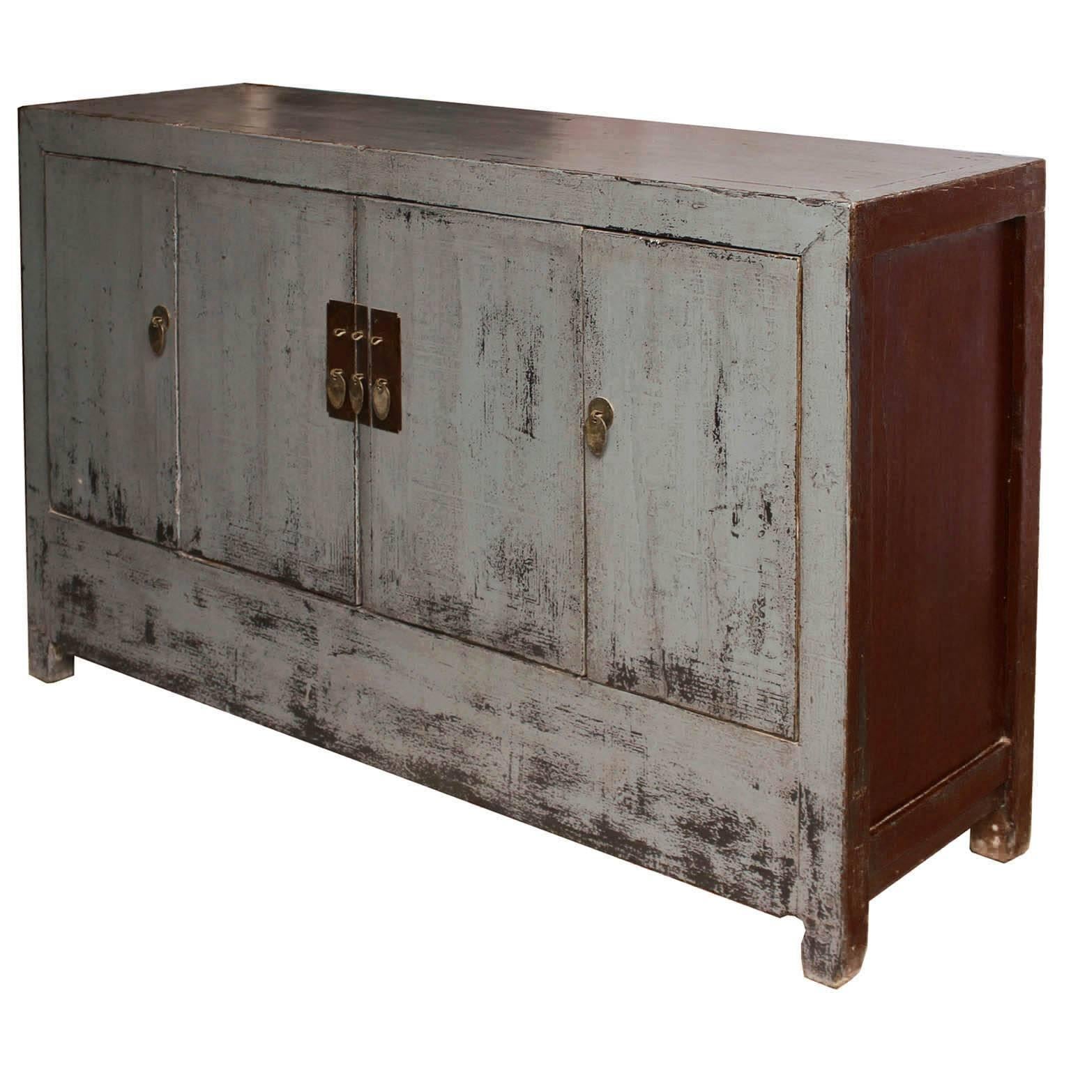Four-door gray lacquer sideboard has a contemporary look with clean lines and straight edges. Use as a sideboard in the living or dining room with lamps and accessories on top. New interior shelf and hardware. Dongbei, China, circa 1900s.