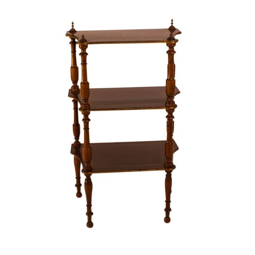 A Classic French Napoleon III brass inlaid mahogany set of shelves made circa 1860. Good side table or next to a chair.