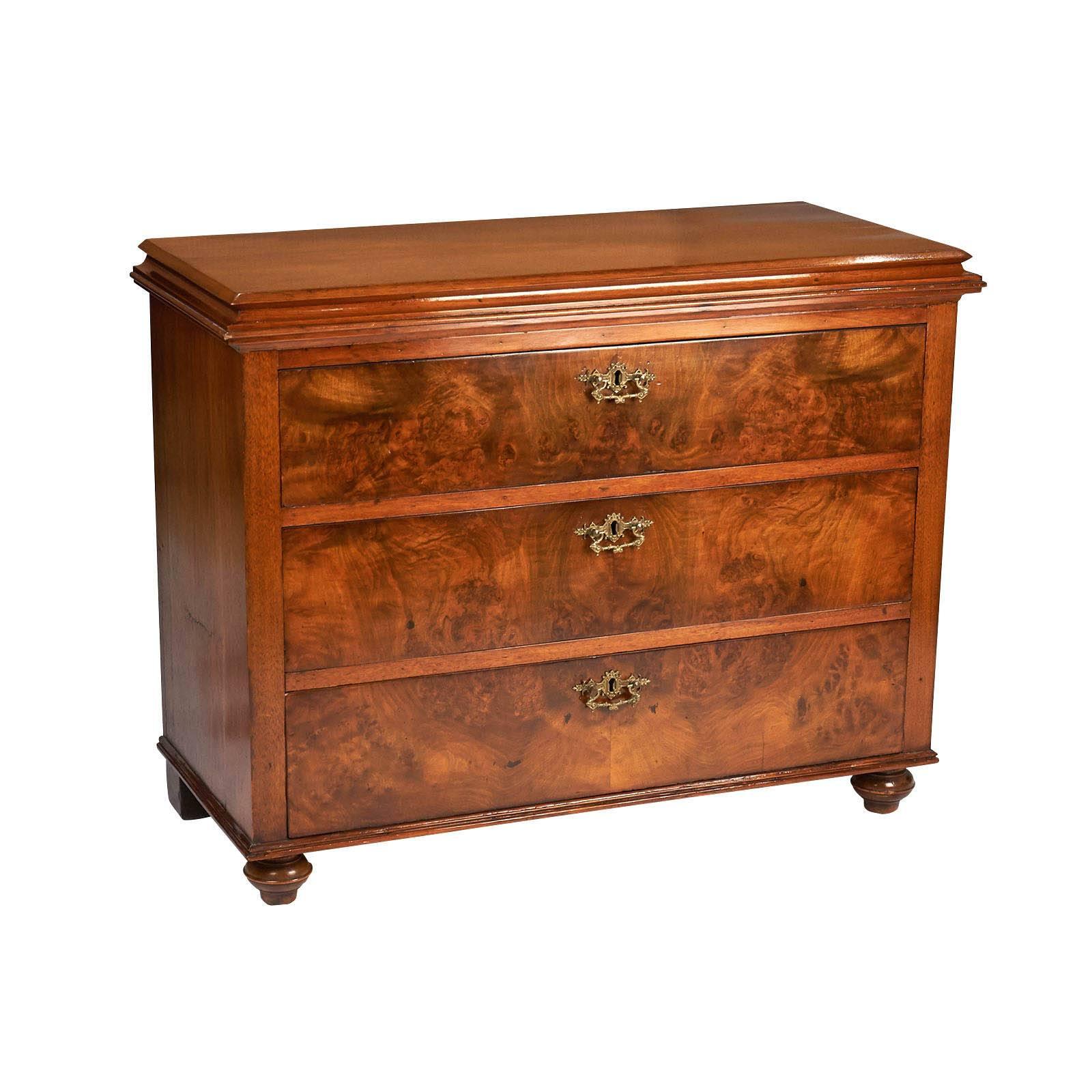 A well proportioned smaller scaled Swedish chest of drawers in Burled Elm, circa 1850. This pieces warm color and its size make it particularly useful as a bed side chest etc. Recently tightened and polished.