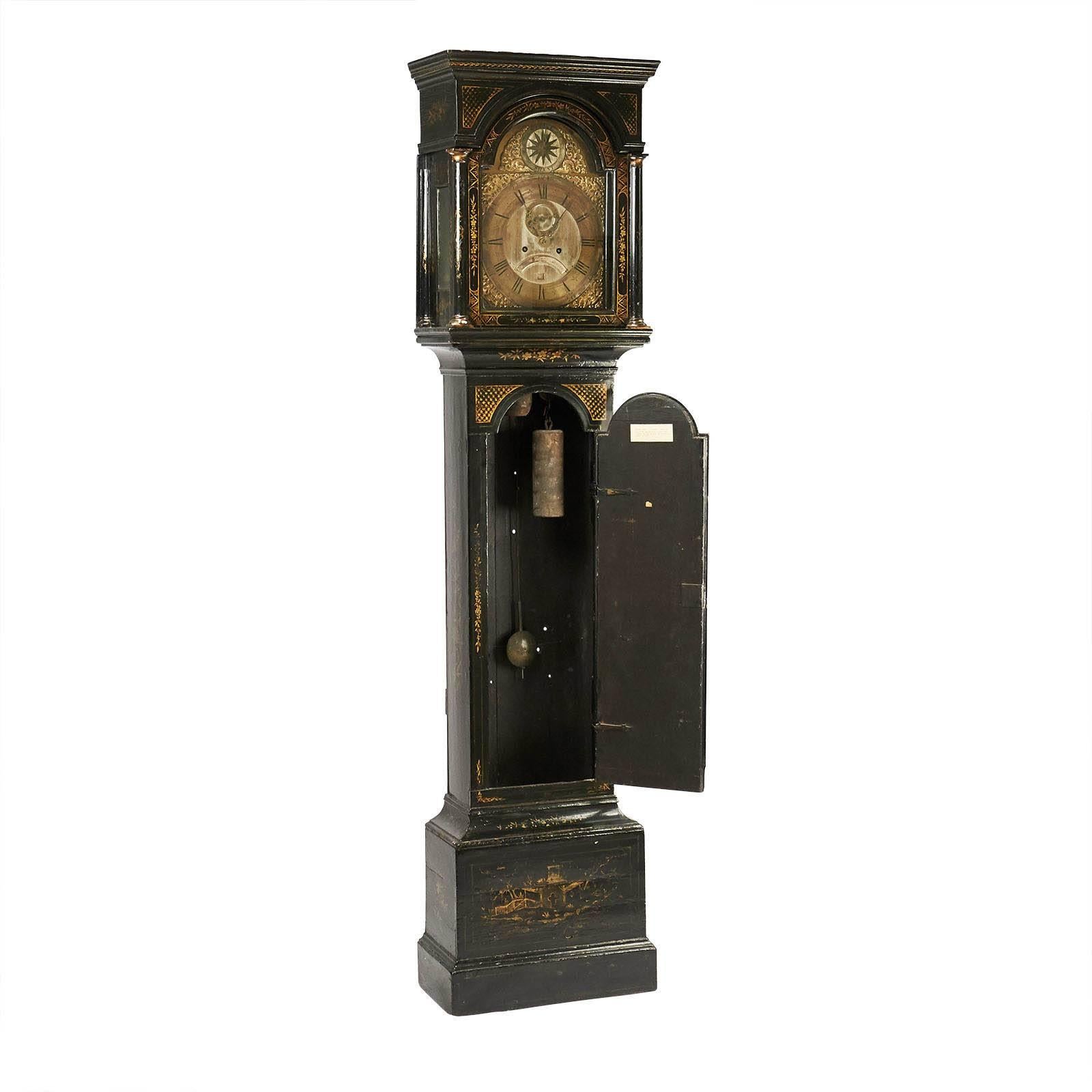 This is a good George II tall case clock retaining an early Japanned surface in the Chinese motif. The case was restored some time ago, and is in Fine condition. The movement is an 8 day brass works by a good recognized English London Clock maker.