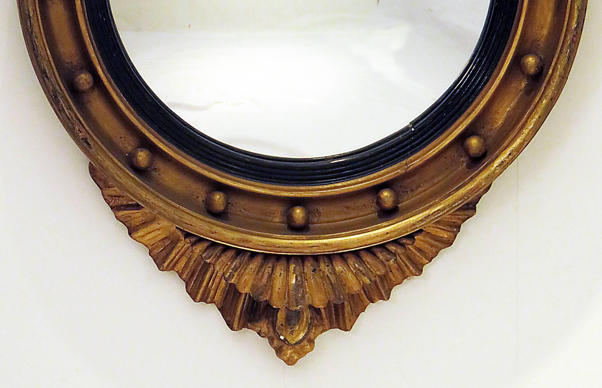 Regency A 19th century Eagle Crested Convex Mirror, England