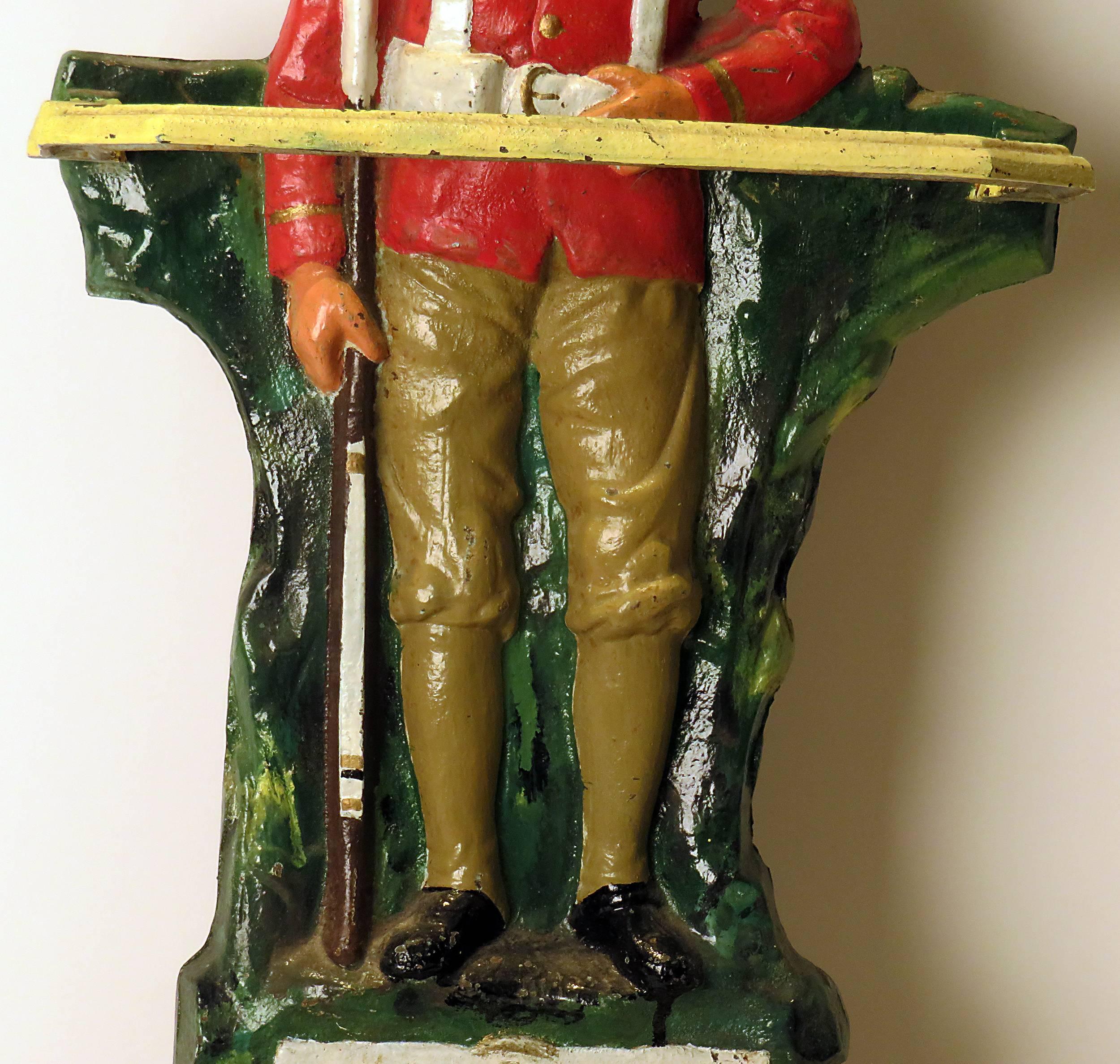 A handsome cast iron umbrella stand depicting an English Anglo-Indian soldier. We think it was made circa 1920 and believe a restorer has refreshed the painted surface. From a local collection.