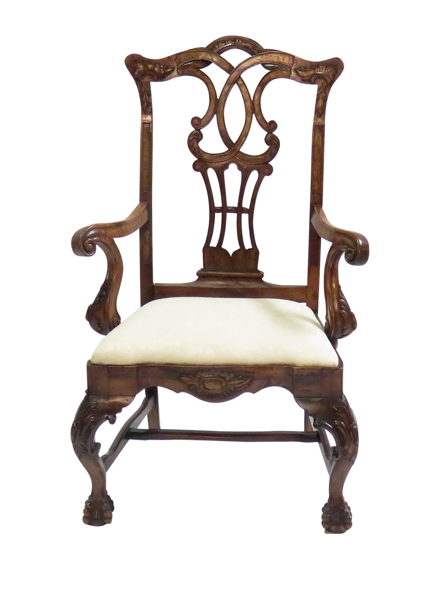 A fantastic and scarce Baroque Portuguese walnut armchair. The great variations and imitations that occur during this period when a standard Chippendale armchair can become this extravagant variant. Recently polished and tightened. We date this to