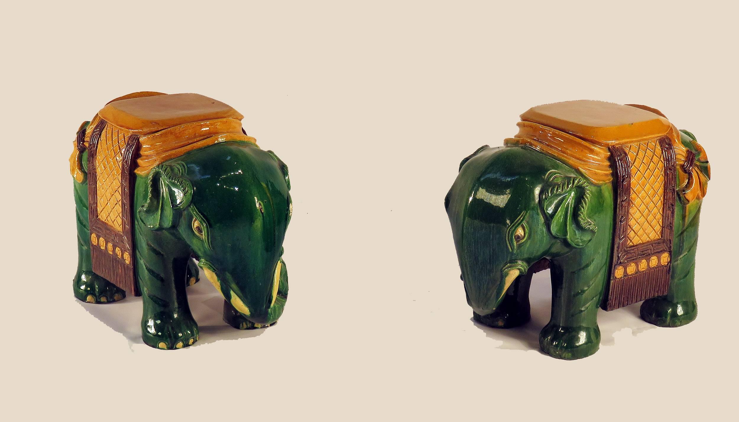 A very nice pair of Chinese Ching dynasty style green glazed elephant garden seats made circa 1930s. Exceptional iridescent green glaze with very nice crisp modeling.