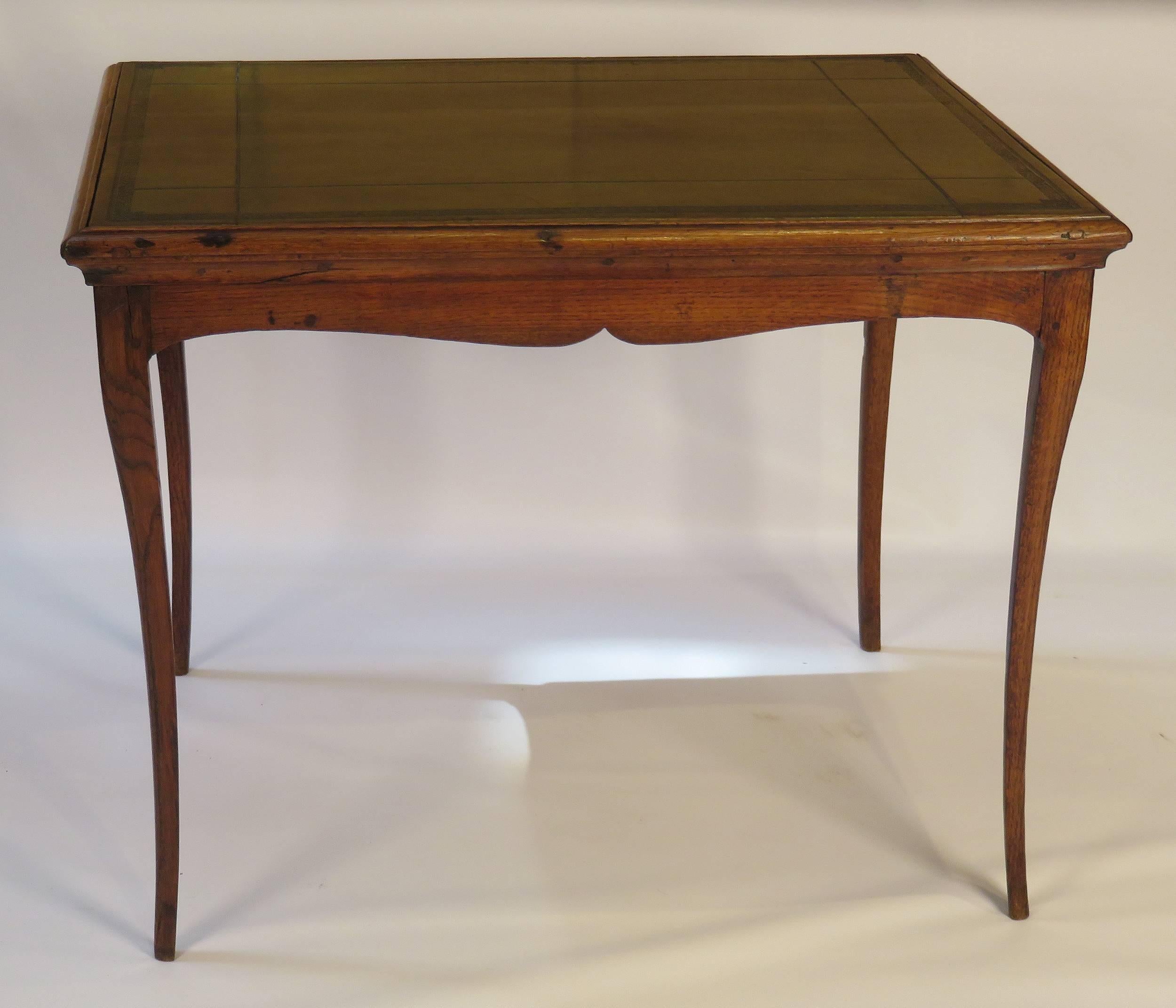 This piece came to us from a good old client. We love the simple lines, good design and usefulness of this table. Originally meant to be used as a desk or game table. Today used the same way or possibly as a side table. Made in France, circa 1780 in