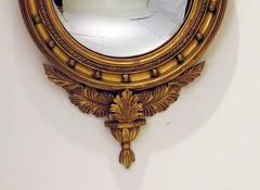 Regency Carved and Giltwood Convex Mirror with Eagle, circa 1830
