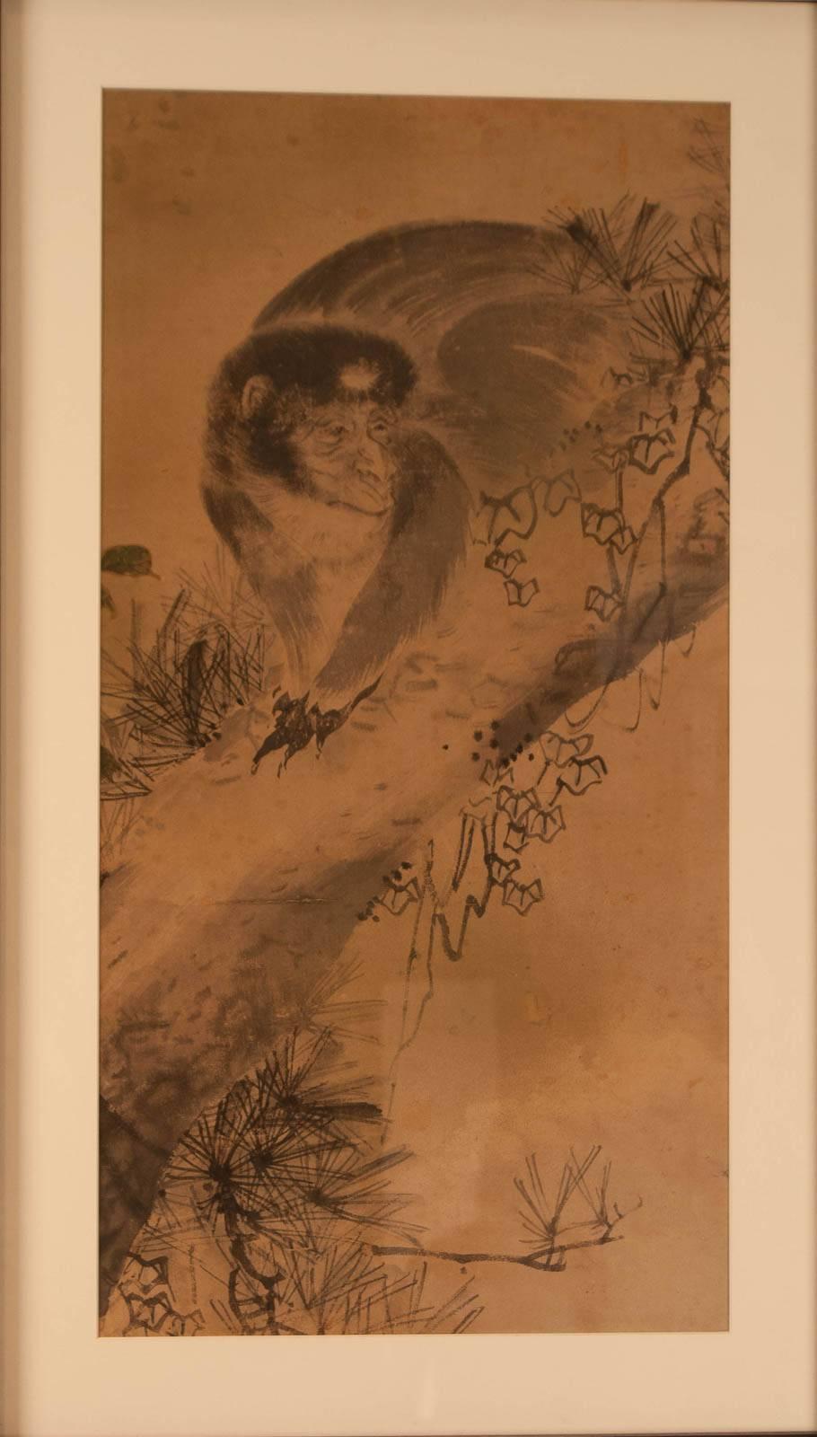 This charming painting of an old monkey was painted in Japan circa 1820 and is most probably a fragment from a larger composition. The painting is done on paper in ink. The framing is fairly recent.