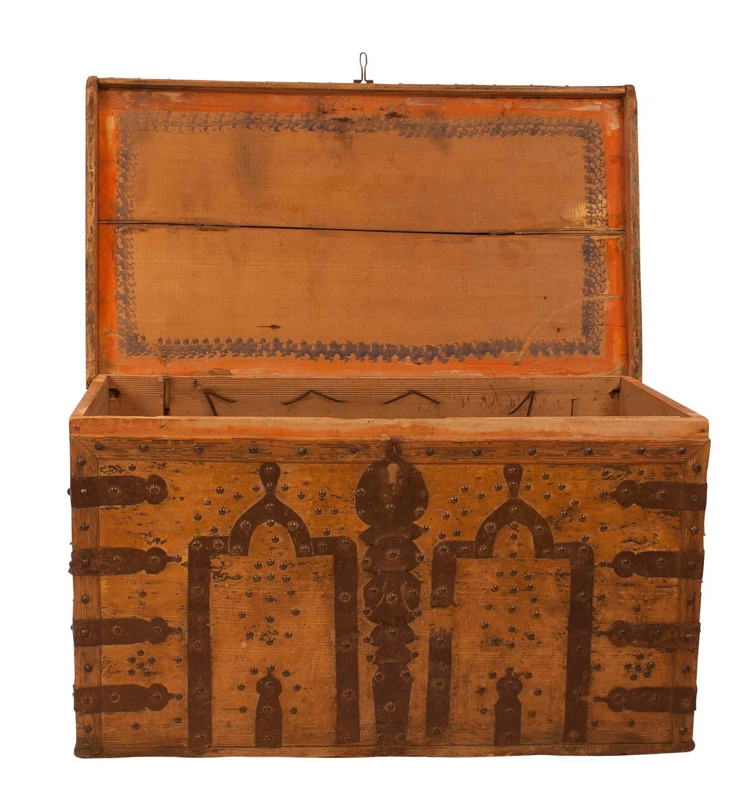 19th century Spanish Colonial trunk. Appears to be cedar with iron hardware and decoration. A great rustic piece in substantially original condition. Useful at the foot of a bed, as a coffee or side table. We date this to circa 1850.