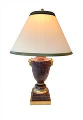 Pareja de lámparas imperio francesas del siglo XIX de pórfido y bronce dorado