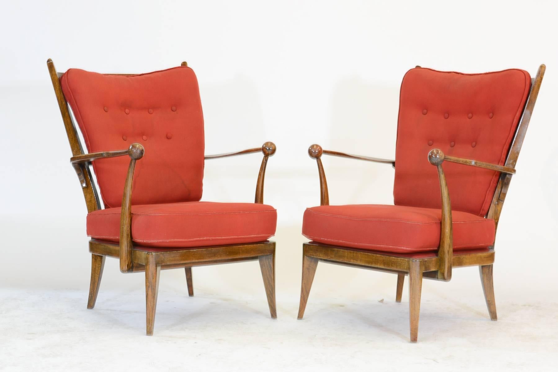 A beautiful early pair of French walnut high back club chair inspired by Guillermes and Chambron for Votre Maison.  They have the Prouvre legs and have a high level of craftmanship