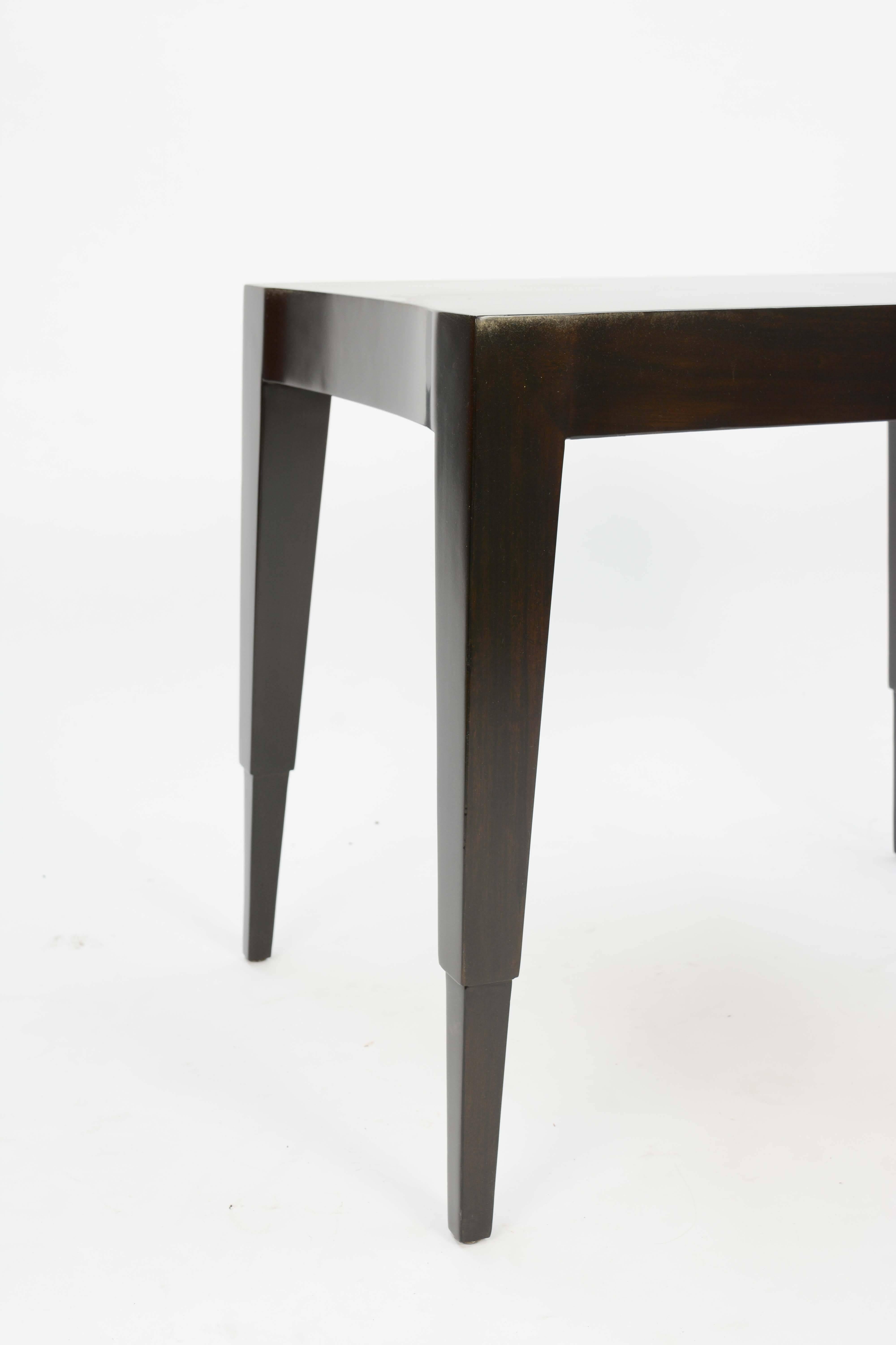 A wonderful and elegant lamp table by Johan Tapp refinished in a dark walnut lacquer.