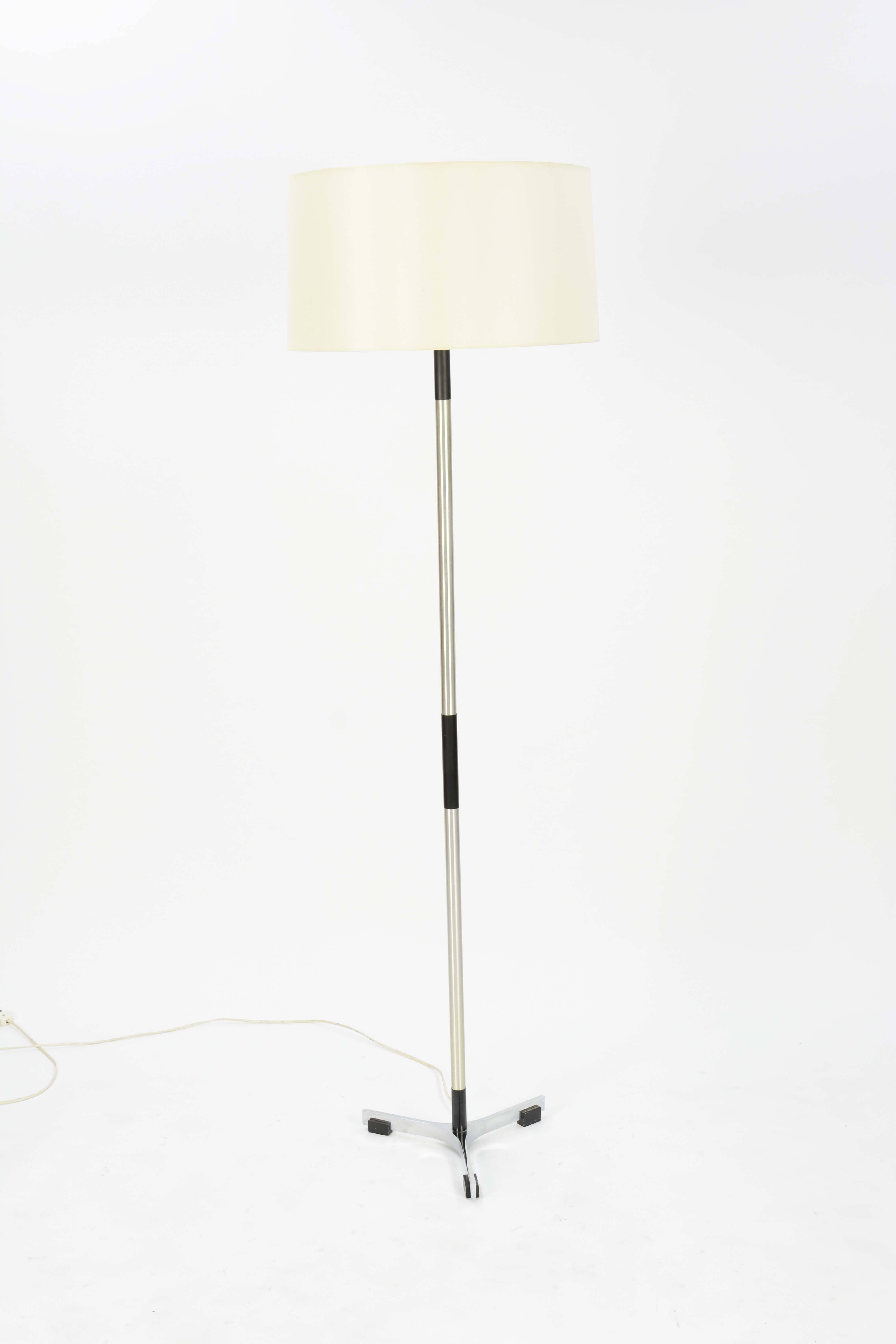 A stain aluminium and black accented tripod floor lamp called the Monolit, 1996 by Jo Hammerberg for Fog & Mørup of Denmark. Shade is not included.