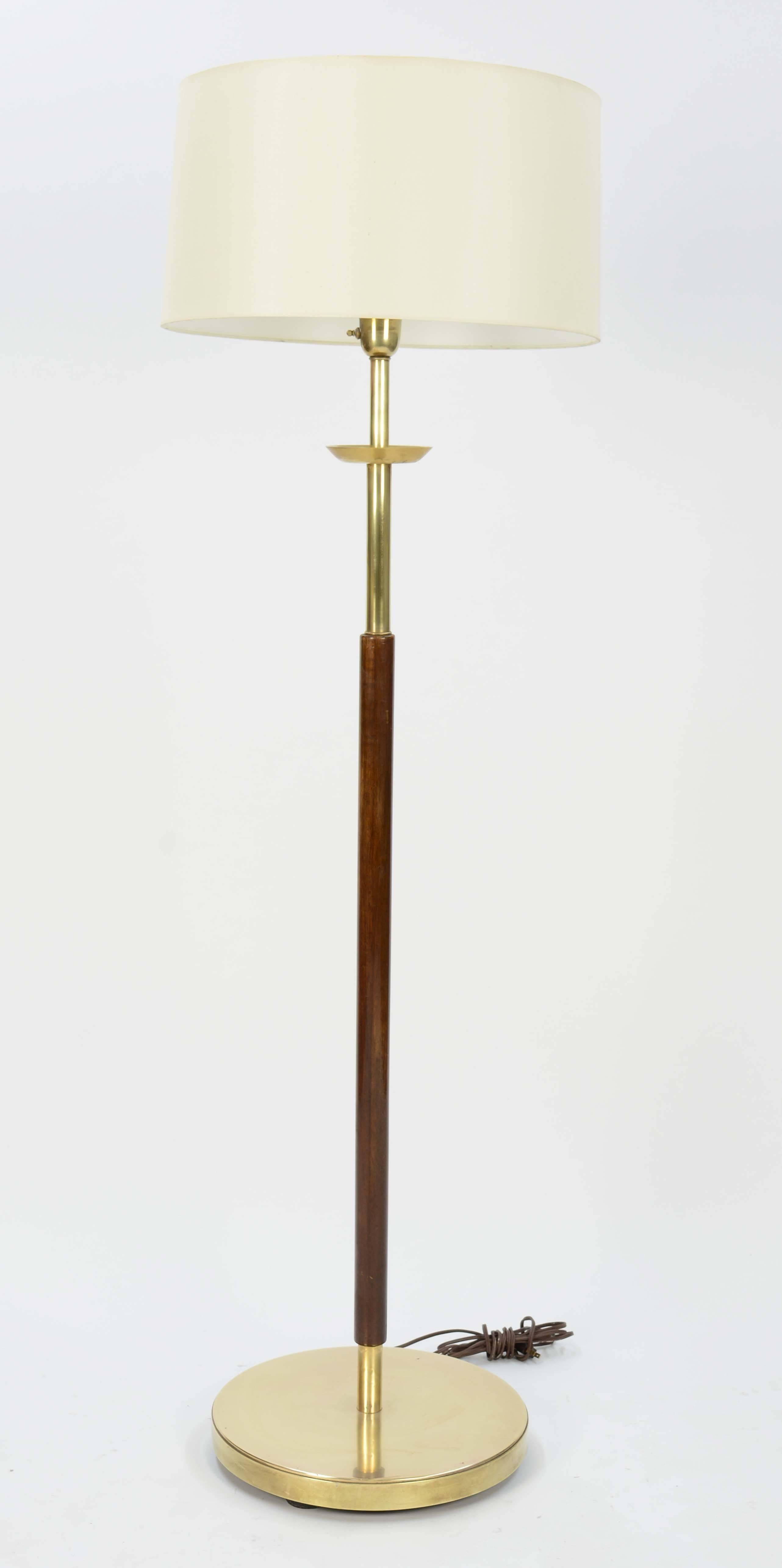 Stunning and Majestic French Floor Lamp in Brass and Walnut. Sold without the shade.  The lamp head feature three adjustable sockets and main stem socket as well