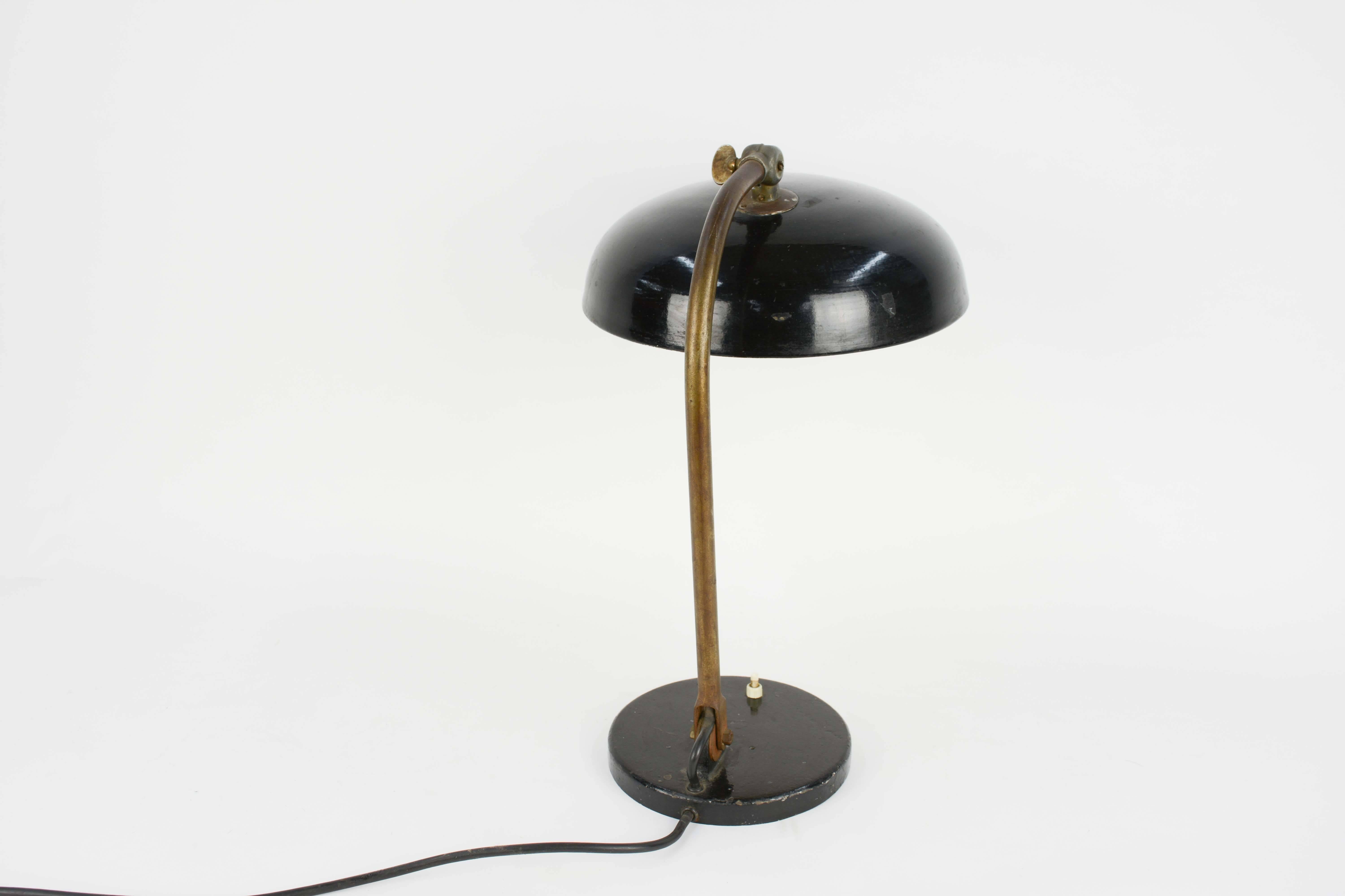 A wonderful Industrial desk lamp with adjustable shade. German engineering from pre war aesthetics.