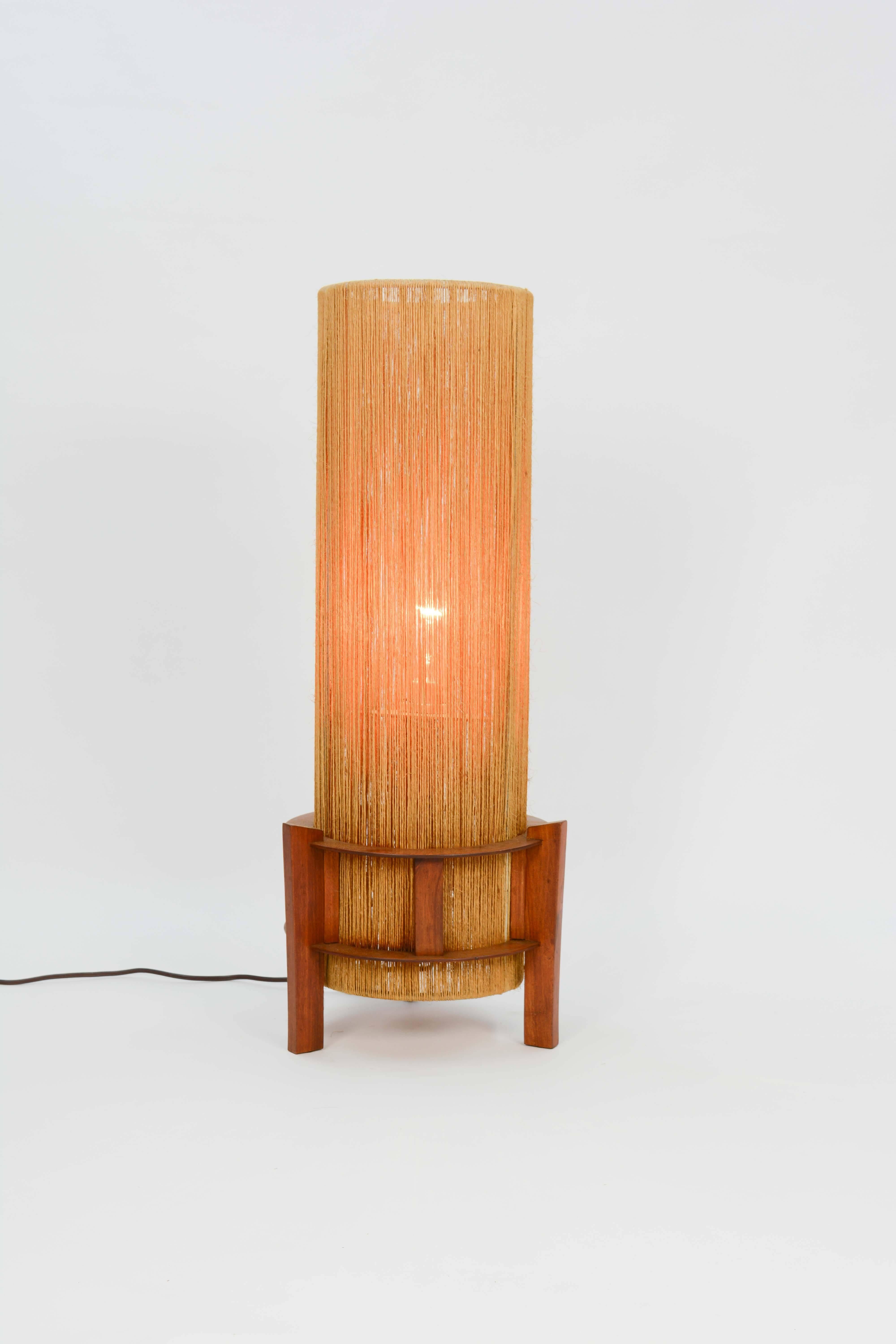 A wonderful floor or tall table lamp by Ib Fabiansen for Fog & Morup. A rare light and hard to find in this great condition.