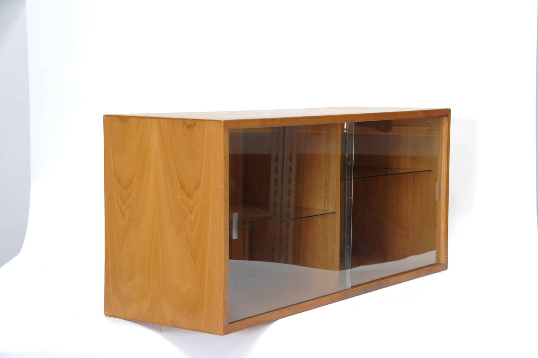 A handsome apir of Danish Floating Wall hang bookcases.