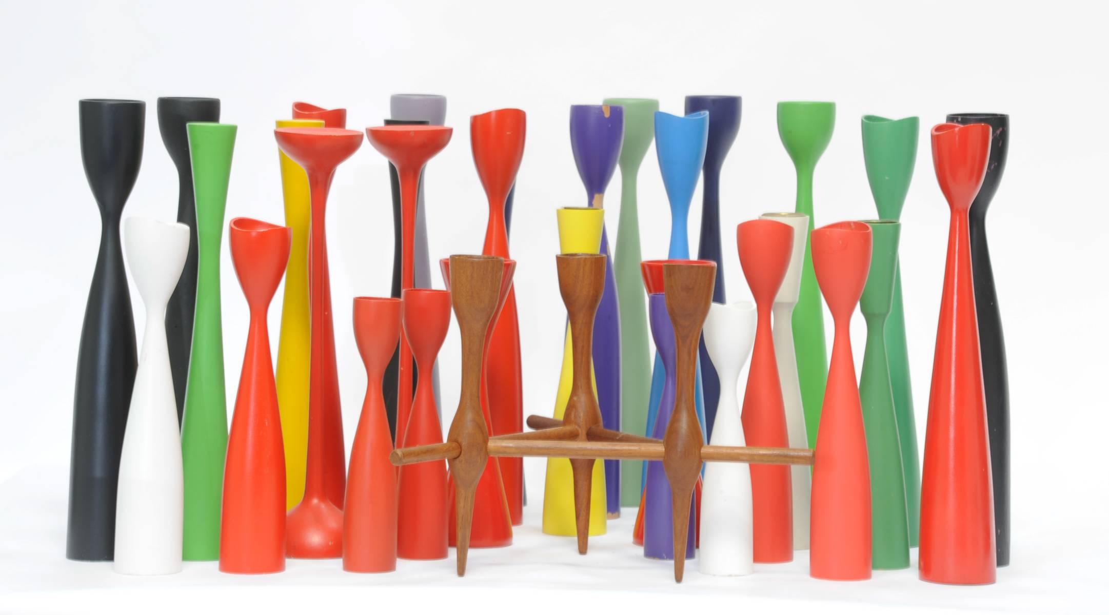 A wonderful set of 33 Danish candle sticks in wonderful set of colors. A playful way to decorate your home for festive events.