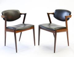 Six Kai Kristiansen 'Model 42' Dining Chairs in Rosewood & Black Saddle Leather