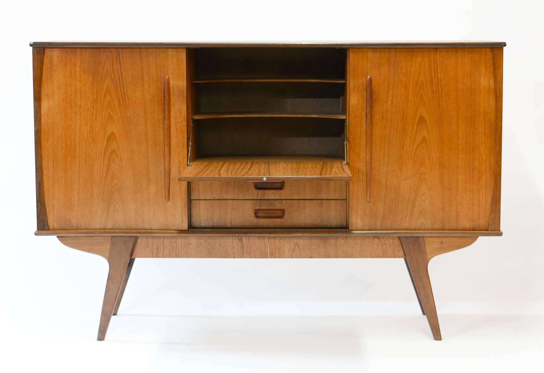 Elegant Monumental Danish Teak Sideboard with Angled Legs and Drop-Door Bar In Good Condition For Sale In Portland, OR