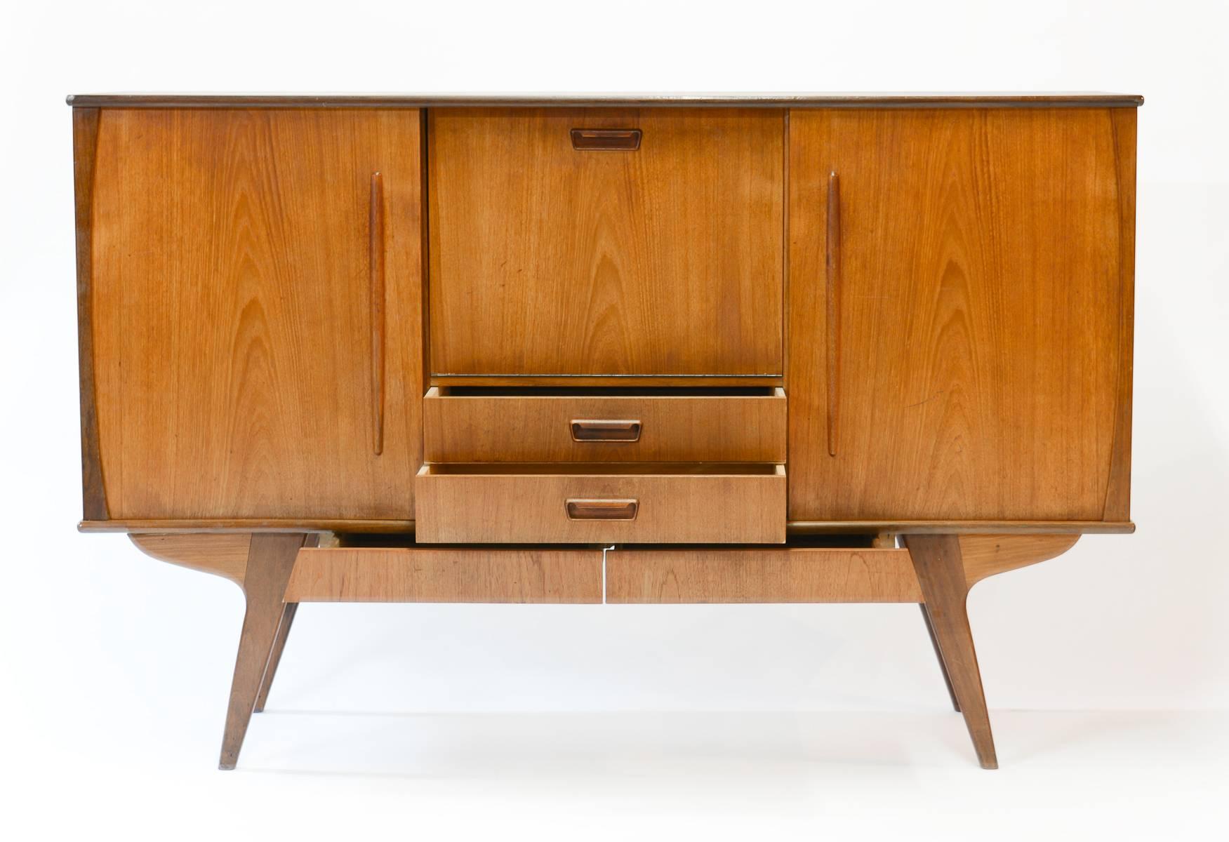 Mid-20th Century Elegant Monumental Danish Teak Sideboard with Angled Legs and Drop-Door Bar For Sale