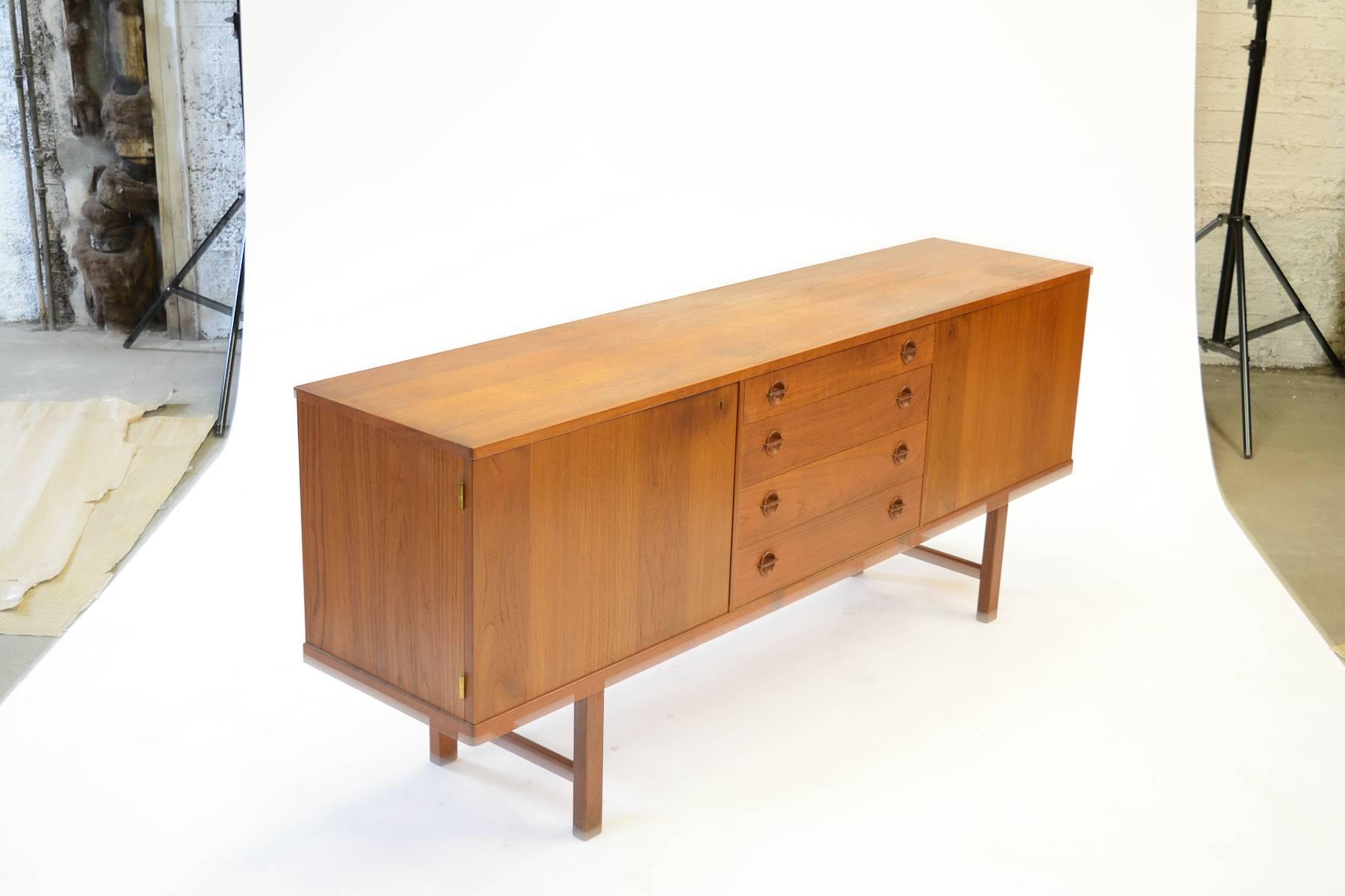 An Exceptional Danish Teak Credenza with Elegant Circular Drawer Pulls In Good Condition In Portland, OR