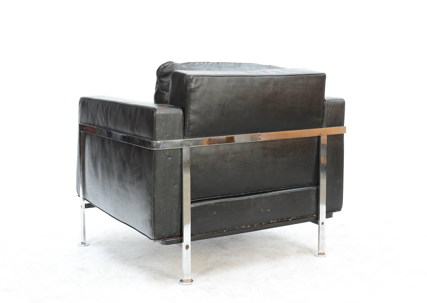 A wonderful club chair from Swiss design teak Trix and Robert Haussmann in it's original, distressed black leather on a chromed steel frame.

Arm height is 18 inches. Inside seat dimensions are 25 inches wide by 21 inches deep.

  
