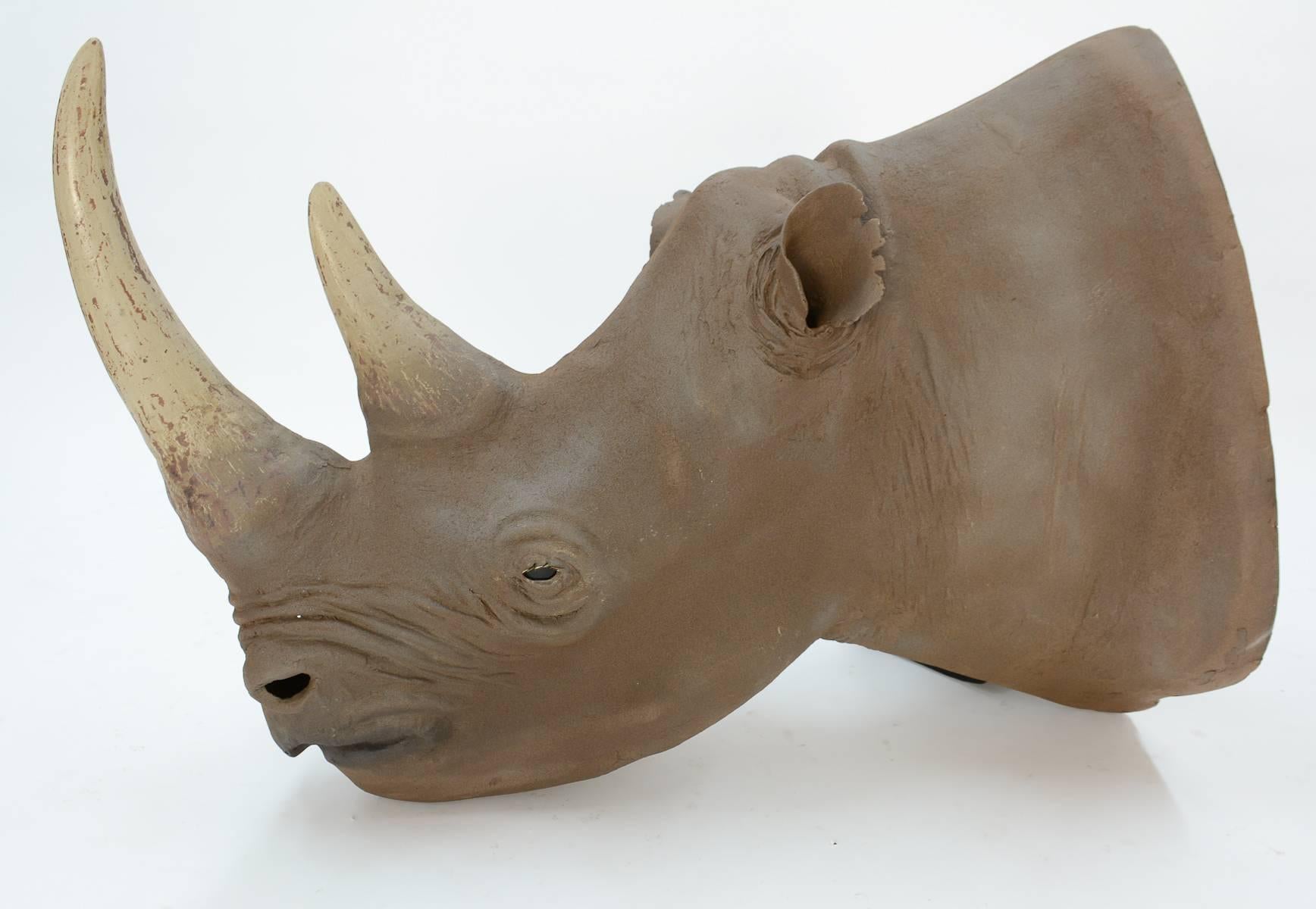 This beauty is a 1950s full scale model of an African black rhino. It is wonderfully detailed and a fun conversation piece. It has been in a private collection since 1952 and was brought back from the UK. It is made of fiberglass and no harm came to