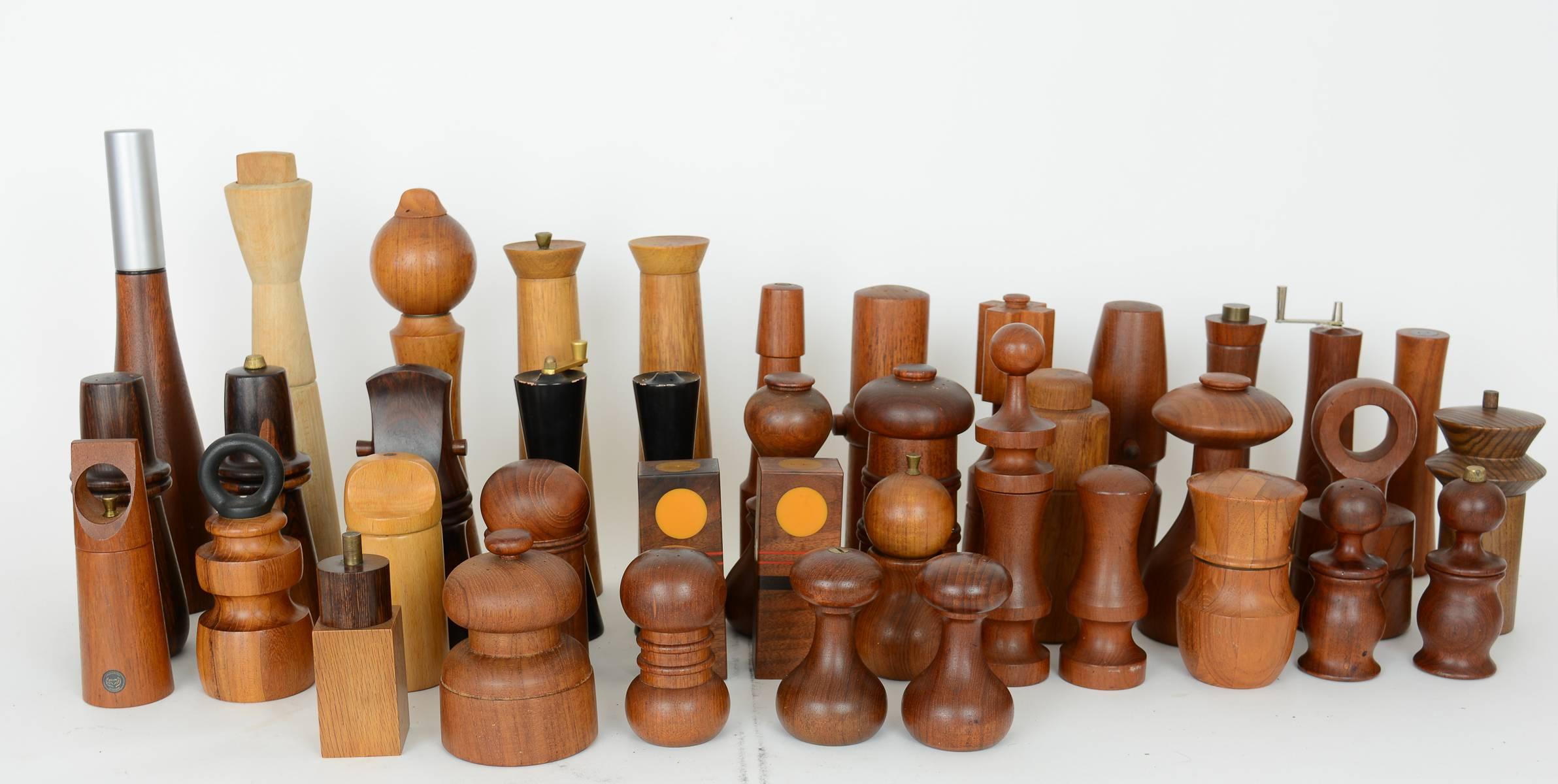 A grand collection of pepper mills and salt shakers by Jens Quistgaard and various other designers. This group includes four rare-wood mills and other hard-to-find editions.

Sold as a collection only.

Measurements vary.