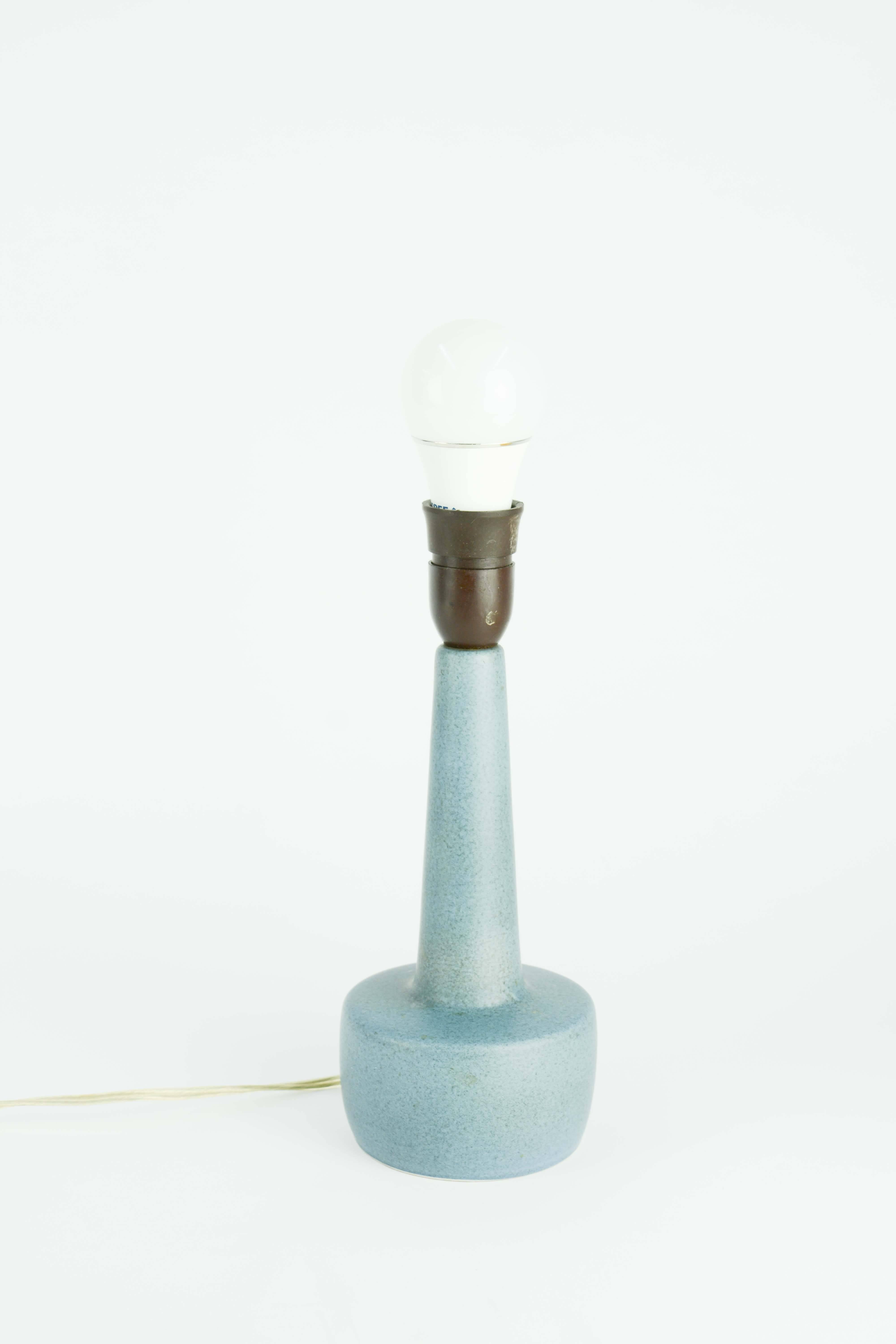 Model 972 by Soholm of Denmark in a Caribbean blue glaze. The lamp is marked RA and 972. It is sold without the shade.