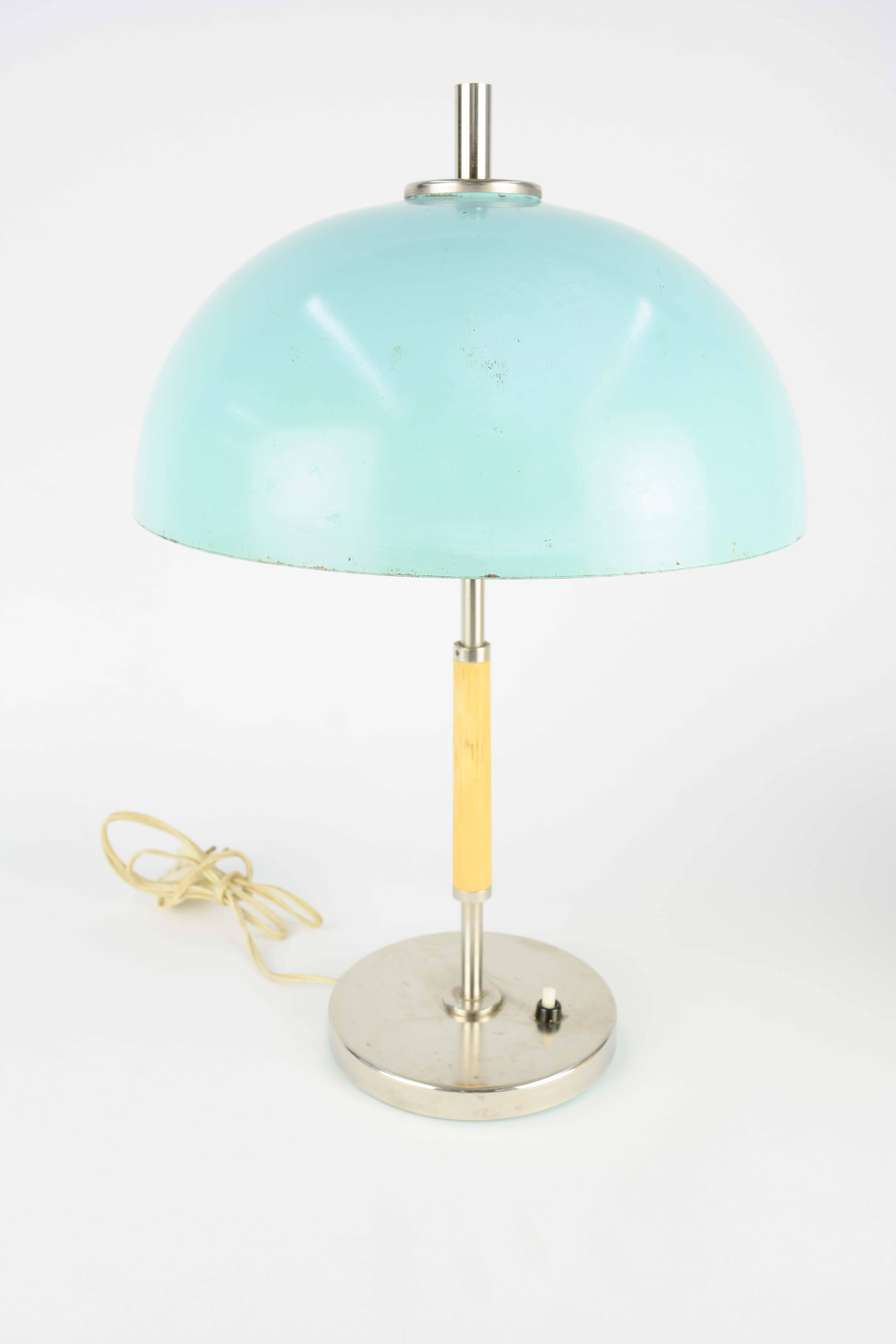 This handsome 1940s, French desk lamp is beautiful in it's wear and design. The lamp is marked 108 on the bottom. A stunning example of post war design.